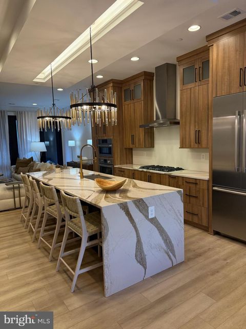 Photo of 14936 Dispatch St, ROCKVILLE, MD 20850 (MLS # MDMC2215380)