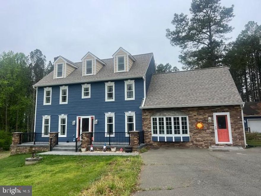 Coming Soon! Nestled on 3 flat acres with NO HOA, this beautifully updated 2,800 sq ft home offers the perfect blend of space, flexibility, and opportunity—including a rare FHA assumable loan at approximately 2.375% for qualified buyers.

Featuring 3 bedrooms plus a large bonus room (potential 4th bedroom) and a converted garage creating a spacious additional living area, this home has been thoughtfully updated throughout. Enjoy new LVP flooring, plush carpet, fresh designer paint, updated lighting, black doors with modern hardware, and a fully renovated main-level half bath.

The kitchen shines with new granite countertops, updated faucet, upgraded appliances, GE Café refrigerator, Miele dishwasher, and a custom pantry with mop sink. Upstairs bathrooms have been refreshed with new vanities, mirrors, and lighting.

Major updates include new dual-zone HVAC (2025), replacement windows, insulated siding, gutters, updated exterior doors, and 80-gallon water heater.

Step outside to an expansive 55-ft deck with pergola, screens, and gas fireplace, overlooking a fenced yard with room to expand. Property also features a detached garage/workshop, barn, run-in shed, and multiple outbuildings.

Private acreage. Modern updates. Rare financing opportunity.