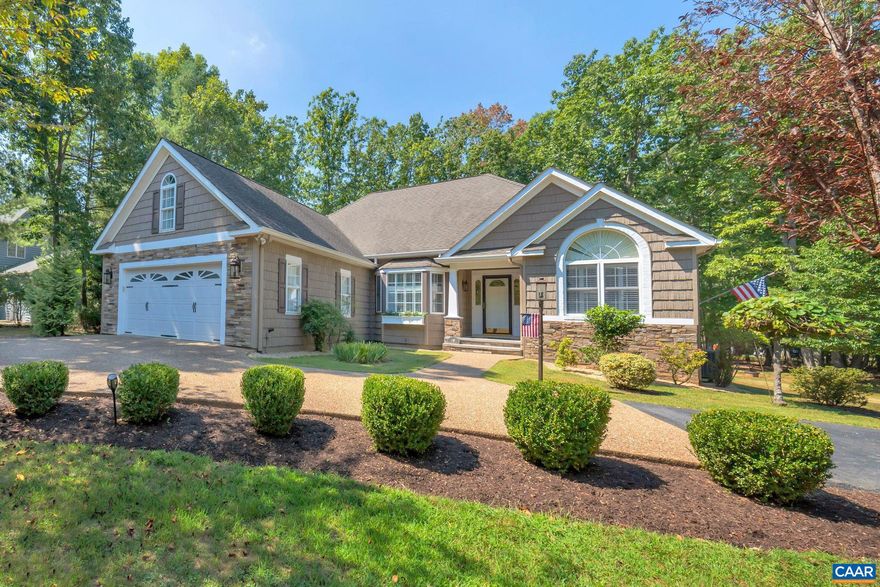 Golf Course Stunner! Situated on a large corner lot overlooking the 11th fairway is a pristine, one- of-a-kind gorgeous home that shows like new. Exceptional attention to detail and thought has been given to every inch of this delightful one-level home. Designated foyer welcomes you to this light, bright open layout gleaming with hardwood floors. Sophisticated dining room with bay window is perfect for holiday gatherings. Great room with vaulted ceiling, stone fireplace and built-ins opens to a tasteful, well appointed kitchen that features a huge island with granite countertops, stainless steel appliances, white custom cabinetry, and separate pantry. A sweet, sunny eat-in dining area is perfect for breakfast and bird watching.  An expansive sunroom teeming with natural light is also home to a trendy loft space (could be a bedroom or an office, you decide!) Gracious primary suite boasts tray ceiling, his and hers closets, en-suite bathroom and French doors open to another casually elegant room. Two more bedrooms, plus a full bath create a separate living area on the opposite side of the house. Over the garage, is a huge bedroom/playroom/teen suite. Private, flat, fenced backyard with cozy firepit and lovely sunset golf views!,Granite Counter,White Cabinets,Fireplace in Great Room