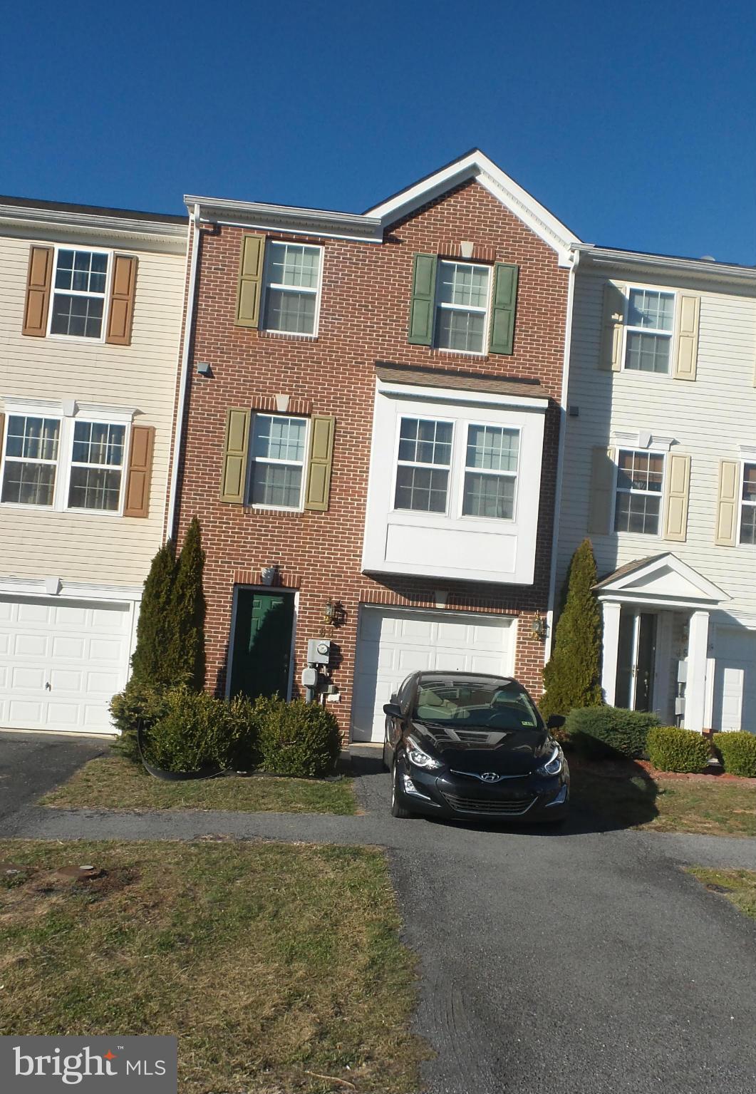 Beautiful 3 bedroom 2 1/2 bath townhome with 1 car garage. Fully furnished kitchen and laundry room downstairs in the main floor den. This place is in impeccable condition!