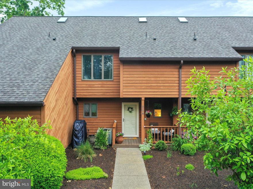 Located in the desirable Tomahawk Ridge section of The Woods, this well-maintained townhome offers scenic golf course views and unbeatable proximity to the Mountain View Pool, enclosed pavilion, and seasonal mobile kitchen—making it the perfect blend of comfort and convenience. Leave the car keys—poolside bliss, pavilion fun, and good eats are just steps from your door!

Enjoy a beautiful view of the 18th hole of the Stony Lick Golf Course right from home. The main level features a spacious open-concept living and dining area with a cozy wood-burning fireplace and sliding glass doors to a private balcony with additional storage. The kitchen boasts upgraded countertops that extend up the wall for a sleek, modern look, along with stainless steel appliances. A stylish powder room near the entry features a warm, stained vanity and updated lighting.

Upstairs, two generously sized bedrooms offer vaulted ceilings and walk-in closets, each with a private full bath. The primary suite includes a balcony and an ensuite bath with a large whirlpool tub beneath a skylight, a separate shower, and a true spa-like ambiance. The upper level also includes a laundry area, a flexible office nook, and plenty of natural light.

Recent Updates & Highlights:

New roof (2024)

New water heater (2024)

New washing machine (2025)

Two balconies (main level and off primary bedroom)

Whirlpool tub with skylight + separate shower in primary bath

Vaulted ceilings and walk-in closets in both bedrooms

Upper-level laundry and office area

Wood-burning fireplace

TRCA dues are billed $375 quarterly. HOA fees are billed $67 monthly. Class B Membership dues are billed $1,600 annually. This property includes a transferable Class B membership, and buyers have the option to upgrade to a Class A membership if desired. For more information about amenities and membership benefits, give our office a call.

Scenic golf course views and walkable access to community amenities

Whether you're looking for a weekend escape or a full-time retreat, this townhome offers easy living in a peaceful, amenity-rich setting.