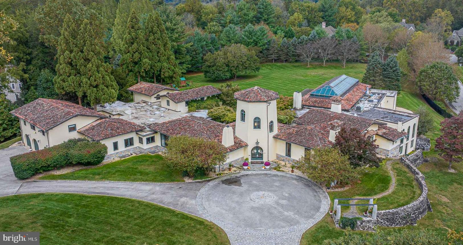 Welcome to Casa Pacifica—a sanctuary of absolute luxury and exclusivity, nestled within an expansive 4.42 acres of meticulously manicured, exclusive grounds. Beyond the gates, an extravagant hillside oasis unveils itself, embodying the epitome of architectural mastery and opulence. Taxes are relatively low at $21,804 for the year 2023. Casa Pacifica is a symphony of meticulous design and craftsmanship, showcasing the finest materials and artistry. Its exterior boasts solid concrete, a distinctive terra cotta Spanish tile roof, and enduring solid construction. Inside, rich woods, exquisite stones, and artisanal painted tiles merge seamlessly, presenting a residence that epitomizes grandeur and sophistication. This extraordinary attention to detail and construction quality sets the residence apart, embodying an unparalleled standard of excellence. As you cross the threshold, immerse yourself in an expansive, V-shaped floor plan meticulously crafted to optimize functionality. It carefully delineates distinct zones for entertainment, dining, culinary artistry, relaxation, and family activities, ensuring a harmonious blend of luxury and practicality. The residence generously offers an abundance of accommodation—ideal for both entertaining and private living. With six opulent bedrooms, nine luxurious full bathrooms, two half baths, and an impressive array of entertainment areas, it sets a lavish backdrop for your lifestyle. Discover the indoor columned pool house, a breathtaking feature that transcends the very concept of luxury living. Along with the pool there is a hot tub, plunge pool and a sauna. This invigorating space encompasses any of your spa needs. Located in close proximity to Award winning schools and golf courses - seize this opportunity to embrace ownership of Casa Pacifica.