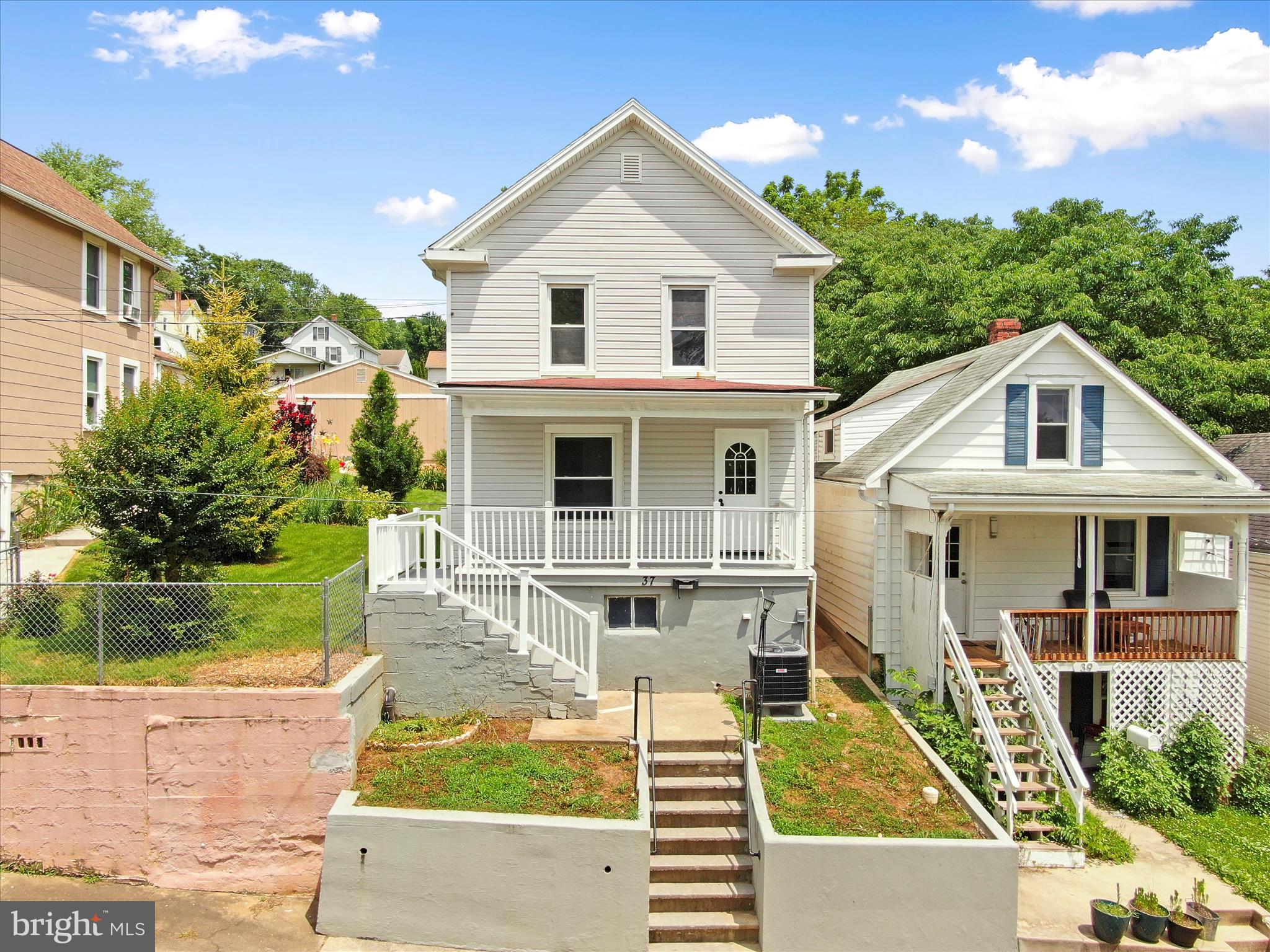 Welcome to 37 E C Street, a beautifully renovated 3-bedroom, 1-bathroom home in the charming town of Brunswick, Maryland. This move-in-ready property features brand-new luxury vinyl plank flooring, updated lighting, a new HVAC system, and a completely remodeled kitchen with quartz countertops and stainless steel appliances. The bathroom has been tastefully updated with a tiled shower and modern finishes. While the windows and vinyl siding were upgraded before this renovation, they still offer great curb appeal and energy efficiency. Located just minutes from the MARC Train, the C&O Canal, and the scenic Potomac River, this home offers the perfect blend of small-town charm and commuter convenience. Enjoy local restaurants, shops, and outdoor activities right at your doorstep.