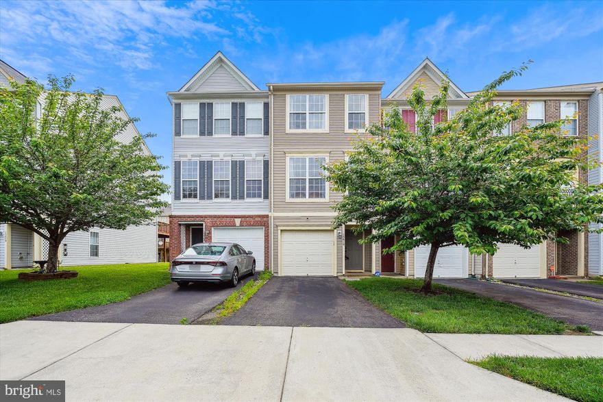 Beautiful 3-Bed, 3.5-Bath Townhome in Woodbridge! This spacious and well-appointed townhome offers comfort, style, and convenience in a sought-after location. The main level features a gourmet kitchen with granite countertops, stainless steel appliances, a gas range, and a large deck—perfect for entertaining or relaxing outdoors. Enjoy the open concept living and dining area along with a convenient half bath. Upstairs, you'll find a spacious primary suite with a luxurious ensuite bath that includes dual vanities and a walk-in shower. The upper level also includes a third bedroom, full hall bath, and laundry area for added convenience. The entry level offers a versatile space—ideal as a third bedroom, guest suite, or rec room—complete with its own full bath. The fully fenced backyard features a private patio area, great for outdoor living. Located close to VRE, major commuter routes, public transportation, schools, shopping, dining, and more—this home combines comfort and connectivity in one beautiful package!