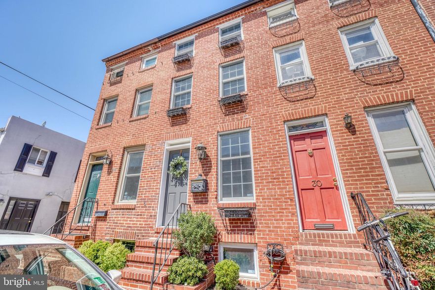 Welcome to 28 E. Wheeling Street, a stunning 1850's home located right in the heart of the Historic District. On a scale from 1 to 10, this is an 11.  The care in which this home has been meticulously restored and updated is unparalleled. You will feel the quality in every inch of this pristine home. As you enter the living room you'll fall in love with the rich hardwood floors, the classic exposed brick, the original beam inlay and the classic fluted moldings. The living room is spacious and filled with natural light while the separate dining room is the perfect size for entertaining!  Even though this home is just steps from dozens of incredible restaurants, you may want to stay home and cook in the incredible kitchen! There is so much to love, from the gorgeous tile floor to the tons of cabinets and counters to a chef's dream--a dual fuel stove! Just off the kitchen is a true urban oasis, a private courtyard with hardscaping and tons of greenery. This space is just perfect for relaxing at the end of a long day or entertaining friends over the weekend.  Back inside, head up the restored winder staircase to the second floor where you'll find a wonderful bedroom and spa-like full bathroom. On the second floor you'll also find the first of two decks!  Head to the third floor where you'll find a bedroom suite which is unrivaled in both size and charm.  Off this gorgeous bedroom is an incredible roof deck with stunning views of the city skyline.  Last but not least, is the large basement that will meet all your storage needs.  The owners have made many updates over the years, some of which include: new HVAC 2020, new gas water heater 2019, new washer and dryer 2019, installation of California Closets, new main water shut off valve 2020, and many more**.  This is a rare find.  Don't let this absolute jewel of a home slip through your fingers!  **Agents, please see an extensive list of improvements in the document section.