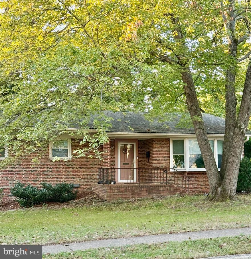 Welcome to 2410 Drexel Street, a warm and well-maintained home in Vienna’s sought-after Stonewell Manor neighborhood. The main level offers a traditional, comfortable layout with generous living space. The oversized gourmet kitchen features stainless steel appliances, abundant counter space, and plenty of room for a full eat-in table. It’s a true gathering spot for everyday meals and weekend hosting. The adjoining living and dining areas flow easily for entertaining, and the living room’s large picture window frames a beautiful view of the expansive backyard. Down the hall, you’ll find a renovated hall bath, two spacious secondary bedrooms, and a primary suite with an updated ensuite bath. There’s room for everyone to spread out while still feeling connected. The lower level adds even more flexibility. A large family and recreation room opens through sliding glass doors to the patio and fully fenced backyard, making indoor-outdoor living simple and inviting. A fourth bedroom works well as a guest room or private office, complemented by another updated full bath. This level also includes a sizable laundry room and an oversized storage area that easily doubles as a workshop. The outdoor space has been thoughtfully improved and landscaped for both beauty and function. Enhancements include a professionally installed dry creek bed and swale by Merrifield Garden Center, along with a 50-gallon pond that can support about two dozen minnows. Mostly native Virginia plantings attract an impressive variety of birds and wildlife, creating a peaceful backyard retreat. Listing photos showcase the property in full spring and summer bloom. Location truly sets this home apart. Enjoy easy access to schools, shops, restaurants, parks, the neighborhood pool club, and the W&OD Trail. You’re also minutes from Dunn Loring Metro, the Mosaic District, area airports, and major commuter routes. This is a home that combines comfort, thoughtful updates, and an unbeatable Vienna location.