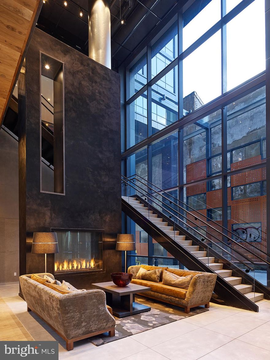 This premier apartment building is located in the vibrant Midtown Village neighborhood of Philadelphia. This modern residential complex offers a perfect blend of majestic social spaces and refined personal comforts, catering to a variety of lifestyles.

The building offers a variety of apartment options, including studio, 1-bedroom, and 2-bedroom open floor plans, as well as penthouse apartments with 10-ft+ ceiling heights and upgraded finishes. Each apartment features open layouts with floor-to-ceiling windows, hardwood floors, and walk-in closets. The gourmet kitchens are equipped with energy-efficient stainless steel appliances, quartz countertops, a dishwasher, disposal, range, refrigerator, and microwave. Some units also offer a movable island option and pantry, along with frameless Italkraft Italian kitchen cabinetry. Additional amenities include in-unit Bosch washer & dryer, air conditioning, storage units, double vanities, wheelchair accessible rooms, private outdoor terraces in select residences, and MechoShade window coverings.

The community amenities are equally impressive. Residents can enjoy a 25th-floor rooftop terrace with built-in grills, TVs, and fantastic views of downtown Philadelphia, as well as an expansive second-level terrace overlooking Walnut Street. The building also features a lounge with a catering kitchen and two-sided fireplace, a game room with shuffleboard and pool table, large and small conference rooms, and an unplugged quiet lounge with Framery office pods. For fitness and wellness, there is an indoor/outdoor fitness center with a terrace and yoga studio, fitness on demand, and an elevated outdoor dog park with a private dog washing/grooming center.

Convenience and services are top priorities in this building. It offers a 24-hour concierge, cold storage for grocery deliveries, a package acceptance and locker system, and a private porte cochère entrance. Parking is available at Parkway (waitlist), and complimentary moving assistance is provided through Updater. The building is pre-wired for Comcast or Verizon cable/internet/phone service, and Wi-Fi/internet access is available throughout. It is also LEED® Silver–certified with a green roof.

The building is pet-friendly, featuring an elevated outdoor dog park and a private dog washing and grooming center.

Ideally situated just a short walk from Thomas Jefferson University Hospital, the building is surrounded by some of Philadelphia’s hottest restaurants, bars, and boutiques. Its central location in Midtown Village offers residents easy access to the cultural and social amenities of Center City, making it a perfect choice for those seeking a dynamic urban lifestyle.

* Pricing and availability subject to change on a daily basis ** Photos are of model units ** Parking may be available for additional fee **