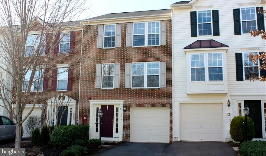 This bright & airy brick-front townhome features an open kitchen & dining area w/granite countertops, tin backsplash, stainless appliances, pantry, & kitchen island/breakfast bar. Lg master bedroom has walk-in closet & attchd bath w/separate shower, soaking tub, & double vanity. Fully finished open basement w/tall windows, laundry closet & unfinished bath. Attached one car garage & paved driveway.