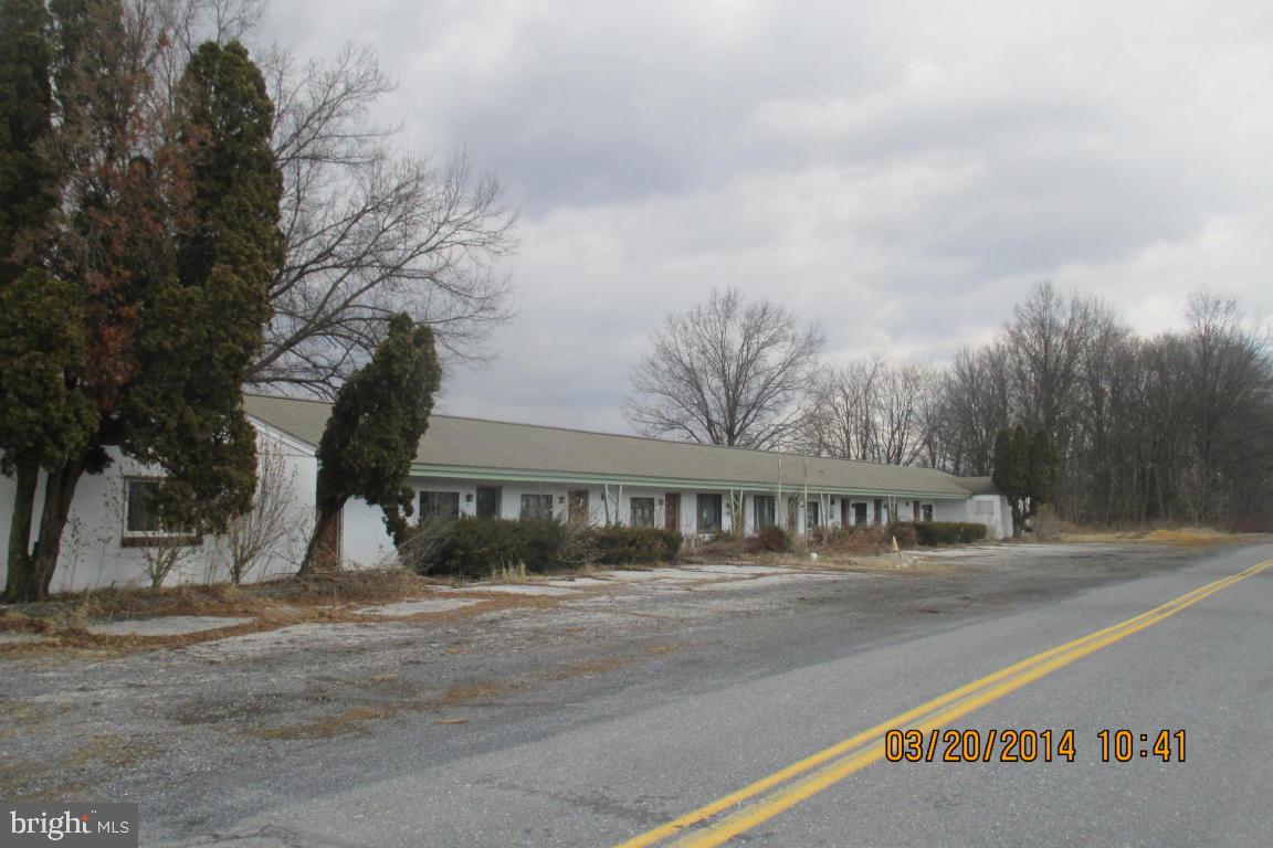 EXCELLENT OPPORTUNITY TO OWN A 12 UNIT MOTEL NEAR ROUTE 78. OVER AN ACRE LOT WITH AMPLE OFF STREET PARKING. GARAGE IN THE REAR. PROPERTY NEEDS EXTENSIVE WORK BUT PRICED TO SELL. SOLD ''AS-IS, WHERE-IS.''