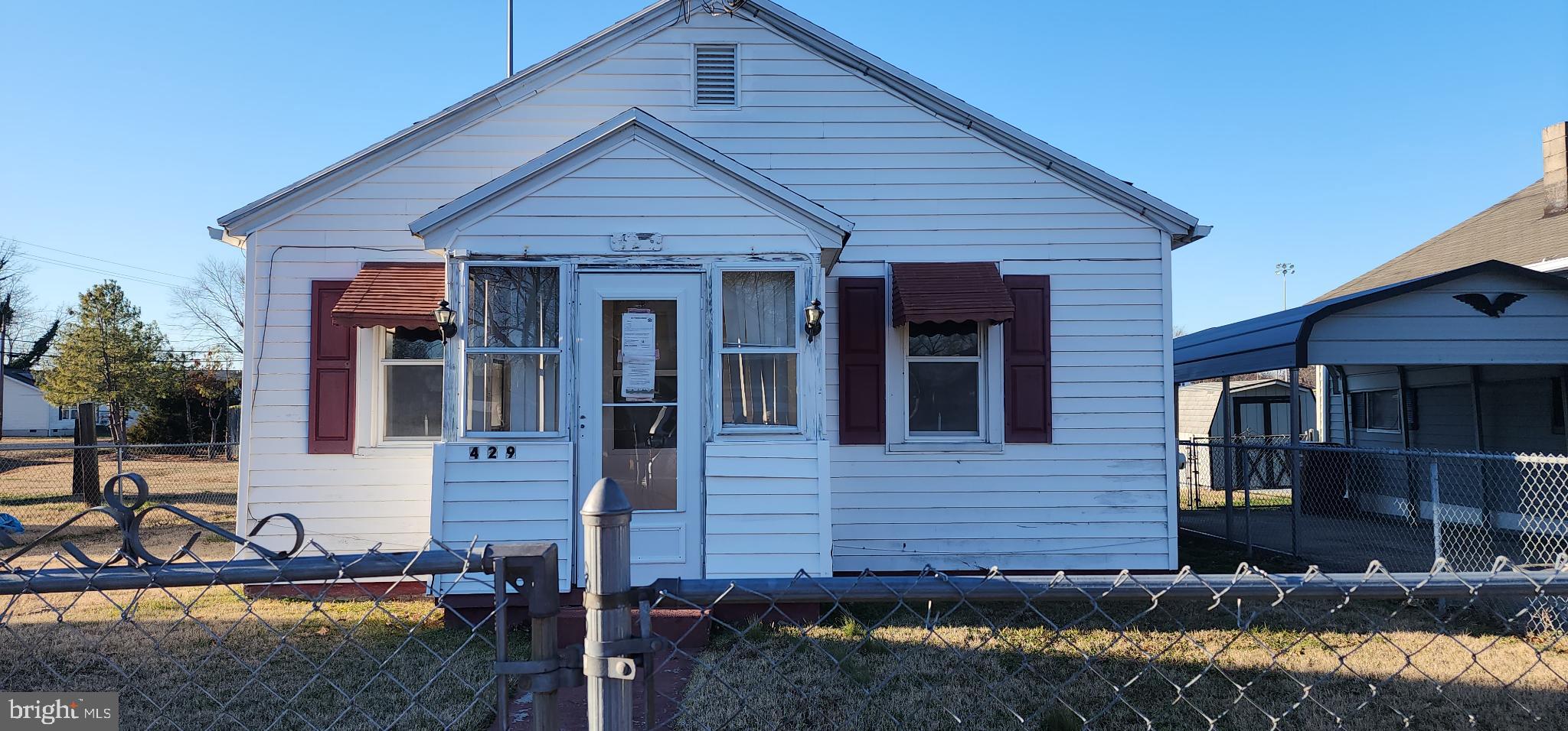 Great starter home. Why rent when you can buy! 2 bed 1 full bath, kitchen, living room and enclosed front porch. Home backs to fields. Fully fenced yard. Could be a great investment opportunity!
