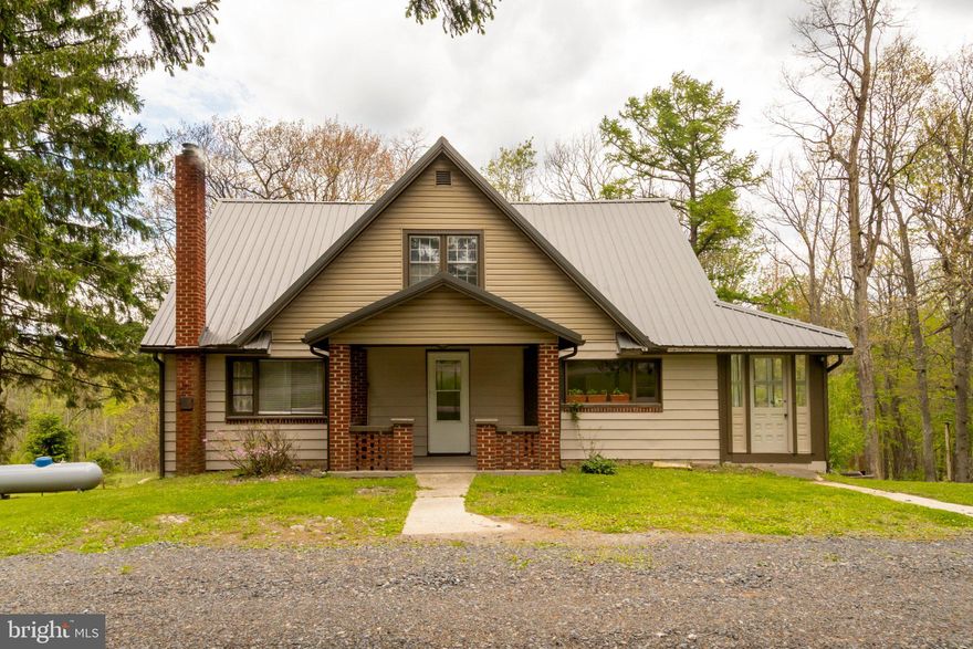 Charming and well-maintained, this 4-bedroom, 1.5-bath traditional home offers the perfect combination of comfort, character, and convenience. Built in 1952 and thoughtfully cared for, the home features beautifully refinished hardwood floors, inviting built-ins, and a cozy living room with a functional wood burner. With over 1,500 square feet of living space, the spacious layout includes an eat-in kitchen connected to the family room, creating an ideal setting for everyday living and entertaining.
Designed with practicality in mind, the home offers abundant storage throughout, including built-in cubbies and a large, unique walk-in closet with two separate entrances. The full walkout basement with garage access provides additional storage and endless potential.
Situated on a private 1.32-acre lot backing to trees along Route 219, this property combines peaceful surroundings with easy access to local markets, restaurants, parks, and everyday amenities. Outside, enjoy the detached garage, carport, outbuildings, ample parking, and a wraparound circular driveway that adds both convenience and curb appeal.
Move-in ready and full of warmth and charm, this property is a wonderful place to call home.