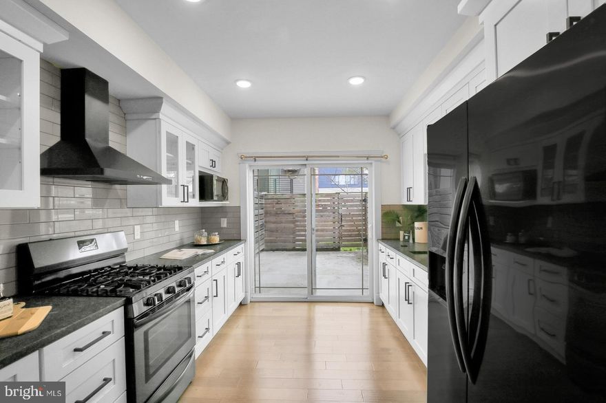 Welcome home to 1909 E Arizona St. Nestled in the heart of East Kensington, within walking distance to all that East Kensington and Fishtown has to offer.  

Enter the home and immediately fall in love with the engineered hardwood flooring, tall ceilings, and large windows which allow plenty of natural light to pour in and make the entire space feel incredibly open and bright. There is an open concept floor plan from the living room all the way into the kitchen which is perfect for when you're entertaining friends or hosting holidays!

The kitchen is stunning and is the ultimate home chef's dream. It includes white shaker-style cabinets with dark hardware, granite countertops, refrigerator, four-burner gas range, dishwasher, and microwave. There is a subway tile backsplash which adds the perfect pop of color and brings the entire design together! There is also an overhanging countertop which is perfect for barstool seating to create an additional dining area. There is plenty of storage space throughout the cabinets and enough counter space to prepare any meal you can imagine!

All three bedrooms are a comfortable size and include ample closet space, ceiling fans, and large windows which allow even more natural light to pour into the home. One of the bedrooms includes carpet flooring while the other two include engineered hardwood. The primary bedroom is marvelous and includes a walk-in closet which can accommodate your entire wardrobe with ease! The closet leads directly to the bathroom which includes stone tile flooring, a dual vanity with plenty of storage, eco-friendly toilet, and a luxurious shower with a tile surround that extends all the way to the ceiling!

The second full bathroom is located in the hallway and is easily accessible from the other two bedrooms. It includes geometric stone tile flooring, modern vanity with matching mirror, and a full-sized bathtub/shower with a subway tile surround. This bathroom truly feels like having a spa inside your own home!

In addition to all of the great features throughout the home, there is also a private rooftop deck! The perfect place for entertaining friends and soaking up views of the Philadelphia skyline. Additionally, there is a fenced-in patio off the kitchen which provides even more outdoor space for you to enjoy. The property also includes a full-sized washer and dryer! 

Last but not least enjoy 3 more years of TAX ABATEMENT.