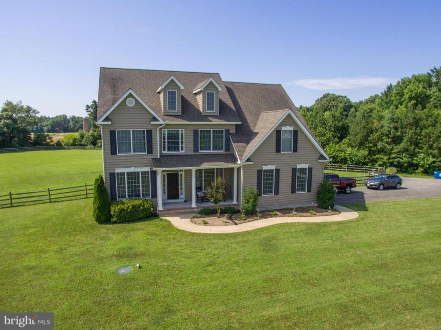 Your dream home awaits in Centreville.  Quality constructed 5BR/4BA home built on 3+ ac. of peace & quiet.  Short drive to 301 or work from your elegant home office w/ hardwired home network.  Upgraded  windows, doors & appliances.  Gorgeous hardwood  flooring, custom stone patio w/ fire pit and fenced yard.   Relax in the 2-story family room wired for surround sound or entertain in the formal DR.