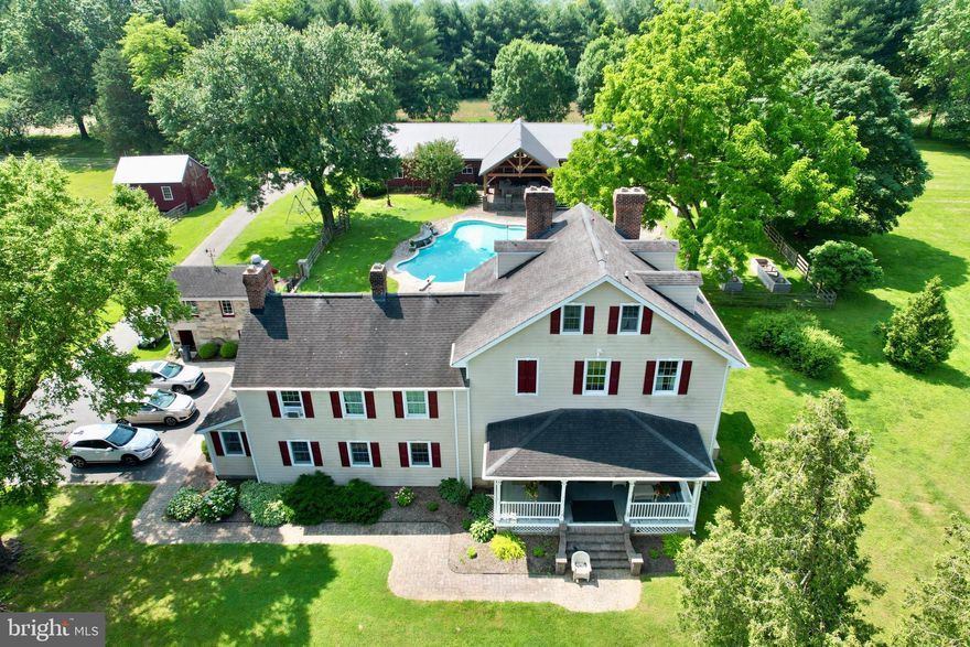3401 Old Level Road is a rare Harford County estate blending historic character with expansive functionality. Formerly Westwood’s Corner, this 58+ acre property in Havre de Grace features sweeping panoramic views, rolling pastures, and complete privacy within a peaceful rural setting.

The centerpiece is an updated early-20th-century farmhouse spanning three levels, boasting six working fireplaces, generously sized rooms, intricate multi-tiered moldings, and over 100 windows illuminated year-round by a low-voltage Window Candles system. The top floor includes a private bedroom, full bath, and a built-in sleeping nook, perfect for guests or extended family.

Outdoor amenities include:

Inground concrete pool with elegant laminar waterfall features

Pool system fully rebuilt in 2015, with a propane heater under 10 years old and a Black+Decker pump installed in 2024

Pool house (2015) with a full kitchen featuring granite countertops, two bathrooms with heated exhaust fans, radiant floor heating, Amish-crafted high-beamed ceilings, and a six-car garage with automatic doors

Propane-equipped grill and bar area designed to host large gatherings comfortably

Advanced surveillance system with 20+ cameras, two-way audio, and network video recorders covering the pool house and barn

Additional structures provide ample opportunity for customization:

Office Barn: Multi-room layout with plumbing, electricity, internet, and HVAC (currently non-operational but repairable). Includes central vacuum, cobblestone fireplace, two half baths, and spacious attic. Former dairy barn lower level with original feed troughs and hookups. Wired for future mini-split HVAC. Ideal for conversion to in-law suite, apartment, or workspace.

Chicken Coop: Structurally sound, under 15 years old, with electrical service

Horse Run-In: Over 100 years old, electrical available but no plumbing, accessed from office barn’s second floor or dairy barn’s first floor. Suitable for rebuild or demolition.

Large Horse Barn (1960s): Equipped with electricity and plumbing, five to six stalls with sand/patio flooring, a tack room with sink potential, and a sizable upstairs area previously used for events and storage

Mechanical systems feature propane-based outdoor utilities, recent upgrades, and modern heating/cooling—including radiant heat in newer structures.

Zoned agricultural, the property suits equestrian pursuits, private estate use, or farming operations. Served by private well and septic, buyers should verify suitability for intended uses.

Not turnkey, this estate offers authentic character, selective modern updates, and significant potential. Whether a private retreat, hobby farm, or multigenerational compound, 3401 Old Level Road provides unmatched scale, seclusion, and versatility.