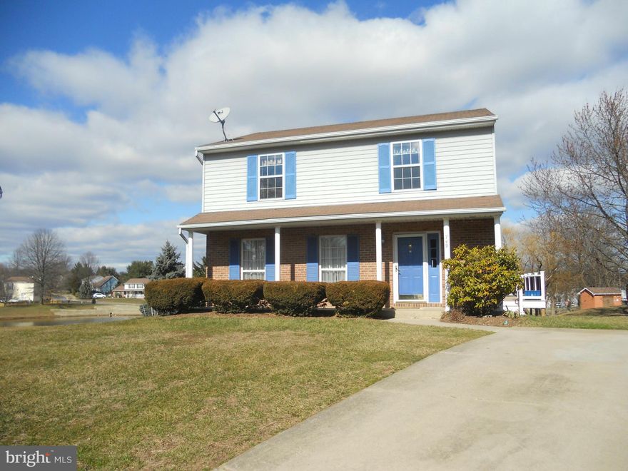 Lovely 4 BR 2 BA colonial featuring eat in kitchen with bay window,formal DR with hardwood floor,large LR,,walk in pantry,LL FR with outside entrance,front porch,large Azek composite deck that runs entire length of  back of house Located at the end of cul-de-sac with beautiful view of pond.Updates include heat pump,refrigerator,dishwasher,carpet,in LR & upper level,deck,and front porch.New dryer!