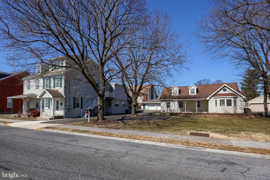 Ideal for owner occupant or investor.  Beautifully renovated single family home, a two unit house and a four car garage on one large property.  Home features large family room, with a fireplace, brand new eat in kitchen, bedroom on the first floor, fenced in yard and patio.  All appliances are included.  The semi features new carpeting and a large deck.  Everything is move in ready for yourself  or tenants.  Four car garage could also be utilized for extra income. Whether you’re looking to live in one unit and rent out the others, or seeking a solid addition to your investment portfolio, this property offers an incredible value with steady income potential and a prime location..