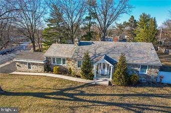 Seller will pay $25,000 towards buyers closing costs! Located in the charming & sought-after Montgomery County, this sprawling ranch offers a unique blend of suburban tranquility, multi generational living & convenient access to local amenities. Situated in a picturesque area, the home provides mature landscaping, just minutes away from schools, shopping, dining, major roadways & local Septa station. This home boasts a classic & timeless design, featuring hardwood floors, fresh paint, spacious living areas, comfortable bedrooms, & well-appointed bathrooms. In home office or In Law Setup! The open floor plan is perfect for both entertaining & everyday living, with a seamless flow between the custom designed & well appointed kitchen, dining & living spaces with wood burning fire place & built in's. Finished basement! Natural light floods the interior, enhancing the bright & airy feel throughout. The exterior of the property is equally impressive, with a slate roof, off street parking, well-maintained yard, ideal for outdoor activities, gardening, or relaxing in a private setting. Whether you're enjoying the quiet neighborhood or taking a short drive to nearby parks, this home offers the perfect balance of peaceful living & easy access to everything Montgomery County & the Phili area has to offer. With it's inviting atmosphere & prime location this home presents an ideal opportunity for those seeking a comfortable & convenient lifestyle in one of PA's most desirable counties!