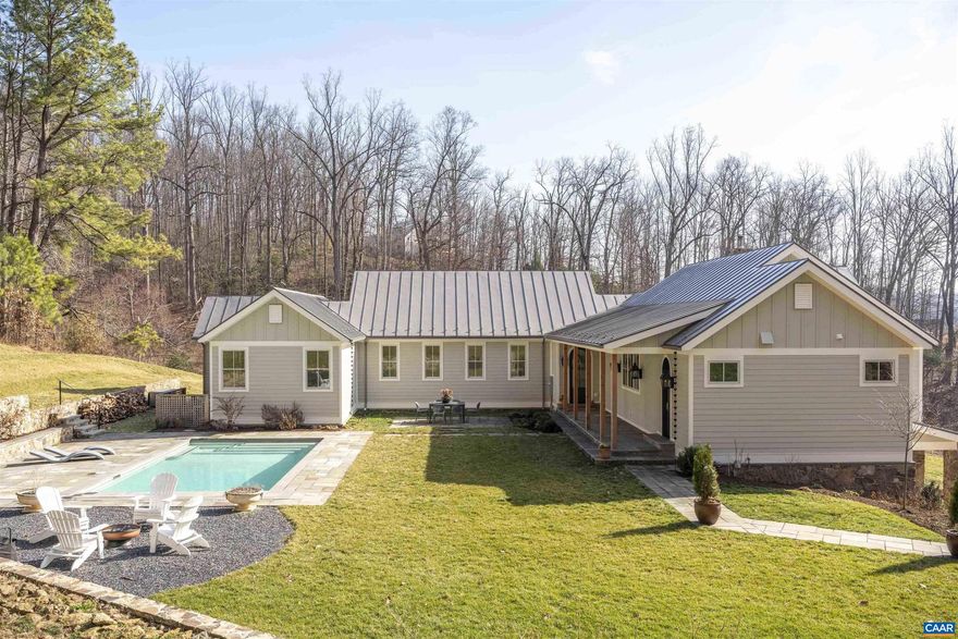 Completed in 2022, this custom residence occupies one of Bundoran Farm's most private and serene pockets, framing sweeping easterly views of pasture and mountain winter views. The thoughtfully designed home offers a main level that balances openness with privacy. An expertly designed kitchen anchored by an Aga induction range and a one-of-a-kind Carrara marble farmhouse sink opens to a light-filled dining room and living room with wood stove and oversized Pella Lifestyle Series windows. The primary, in a separate wing, offers a quiet retreat, with its large soaking tub and access to the deep porch with quintessential North Garden views towards the East. Three additional en-suite bedrooms provide ample space for family or guests. The high-ceilinged terrace level delivers two offices, a bedroom, two full baths, and a large, unfinished, sun-drenched, bonus room ideal for a family room or gym. Outside, a pool and courtyard anchor the front of the home; a deep side porch captures Bundoran's protected viewshed. Zero road noise, and 20 minutes from town ? with 14+ miles of private trails that rival a National Park. Bundoran Farm homes rarely come to market. This is a rare one.,Marble Counter,Wood Cabinets,Fireplace in Living Room