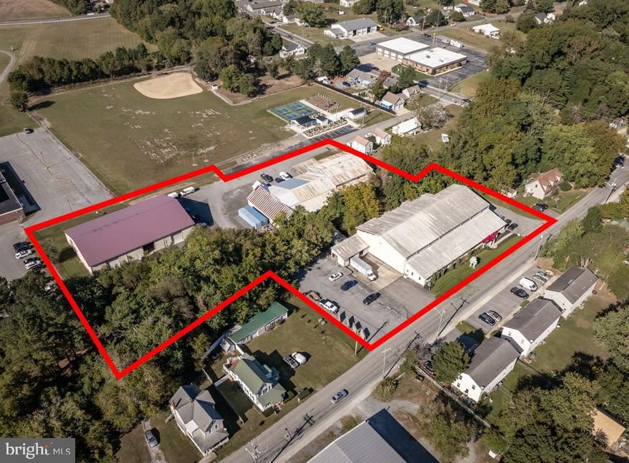 This exceptional industrial property offers a rare investment opportunity, featuring a long-standing and reputable tenant, strategically located in the highly sought-after Selbyville, Delaware,
market. The property consists of over 39,500 square feet of warehouse, office, and show room space spread across 3 Acres, making it ideal for investors seeking stable cash flow and growth potential.

Since 1969, this property has been the home of Cabinetry Unlimited, a well-established business servicing the entire Delmarva Peninsula. Cabinetry Unlimited has successfully operated their business for decades, showcasing the stability of the tenant and their commitment to the property for the foreseeable future.

The industrial site includes three buildings, each equipped with essential features such as loading docks, drive-in doors, and ample manufacturing space. With its combination of a prime location, quality
tenant, and versatile industrial features, this property presents an outstanding opportunity for investors seeking a secure, income producing asset.

5/1/2025 NOI $180,000 with quarterly percentage rent bonuses. Initial term through April 2028 with multiple options to extend.