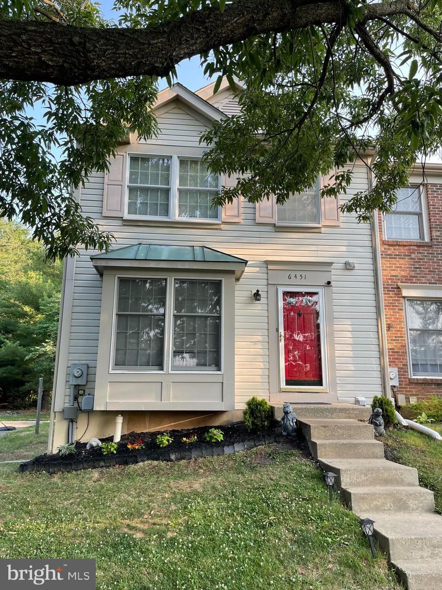 This spacious end unit home had the roof and flooring replaced with in the last 2 years. Roof work provides a 20 year transferrable warranty !

Entryway greets you with a half bath and coat closet. Kitchen spacious enough to function as an eat in kitchen or provide more cabinet space. Dining room right off the kitchen leading into the living room with access to a large deck, great for hosting. New flooring throughout main level leads up the stairs with high cielings to bedrooms. Main bedroom has own full bath. Two additional rooms have the hall full bath. Basement has lots of potential, unfinished but offers high cielings for a great canvas.