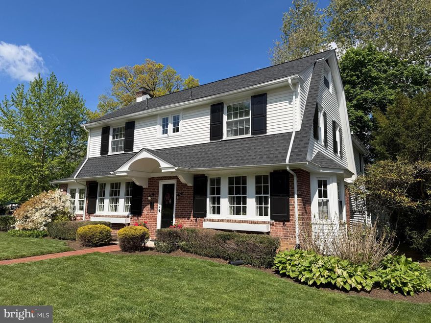 Welcome to 501 Rodman Avenue…a home that is as beautiful as it is inviting.
Located in the highly desirable Jenkintown Borough, this beautifully maintained classic brick Colonial is as stunning inside as it is from the curb. From the moment you arrive, there is an undeniable sense that this home has been truly loved & meticulously cared for. A charming brick walkway leads to the front entrance, surrounded by mature, thoughtfully curated landscaping that sets a warm & welcoming tone.
Step inside to a bright, airy foyer with gleaming hardwood floors, a coat closet & an effortless flow throughout. The elegant living room is both inviting & refined, featuring crown moldings, custom built-ins & a classic wood-burning brick fireplace with slate hearth & beautifully crafted mantel. French doors open to a versatile adjoining space currently used as an office…perfect for a den, playroom, or additional living area…with access to the private rear patio.
The formal dining room offers hardwood floors, crown molding & chair rail, along with a charming alcove-style bay window that adds architectural interest. Stylish wallpaper enhances the warmth, making this room ideal for everyday living & entertaining of family and friends.
The updated eat-in kitchen is the heart of the home…warm & inviting, featuring granite countertops, tile flooring & backsplash, recessed lighting & a full complement of appliances including built-in range & microwave, refrigerator, dishwasher & garbage disposal…ideal for everyday living, casual meals & time together. The dining area overlooks the beautifully landscaped backyard, with direct access to the patio for seamless indoor-outdoor living.
Just beyond the kitchen, a wonderful & versatile living space offers exceptional flexibility. Currently used as a family room, this inviting area features ample closet storage & a full bathroom with tiled walk-in shower…ideal as a guest suite, private in-law space, or additional living area.
A beautifully appointed powder room completes the first floor.
Upstairs, a charming landing with window seat & built-in storage creates the perfect tucked-away reading nook. The spacious primary suite features a beautifully tiled en-suite bath with shower stall & linen closet, along with a generously sized walk-in closet. French doors lead to a private balcony overlooking the backyard…a rare & inviting retreat. Recessed lighting & ceiling fan enhance comfort & ambiance. Two additional bedrooms are generously sized, filled with natural light & offer excellent closet space. The hall bath has been beautifully renovated with marble vanity, classic tile flooring & tub/shower with glass doors, plus a large linen closet.
A walk-up attic offers additional flexible space & is partially finished…ideal for storage, home office, or potential additional bedroom.
The lower level adds versatility with a convenient entry area off the patio, perfect for coats, shoes & everyday essentials, plus a large closet that can serve as a pantry. The partially finished basement includes a separate laundry room & updated systems, which include 3 zones of central air & gas heat to provide year-round comfort. A short set of steps leads to a landing with access to the patio or continues up into the kitchen.
Step outside to a spacious brick patio surrounded by lush, mature landscaping…an incredibly private & peaceful setting. A detached two-car garage offers additional storage, while the generously sized driveway provides ample parking.
Situated on a picturesque, tree-lined street with sidewalks & street lighting, this home offers exceptional walkability to shops, restaurants, pubs, the Hiway Theater & the historic Jenkintown Library. Just a short walk to the very desirable Jenkintown Train Station with easy access to Center City Philadelphia. Located within the award-winning Jenkintown School District.
Showings begin Friday, May 8th…schedule your private showing today.