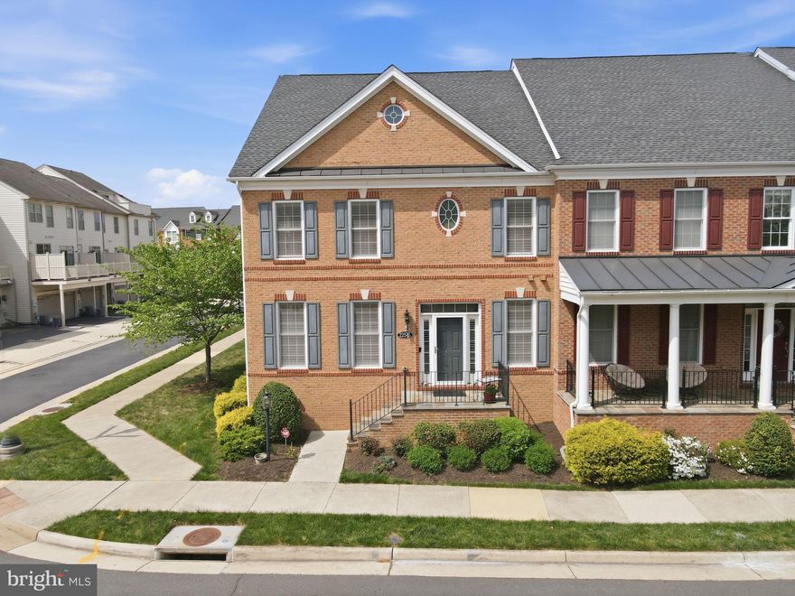 If you've been looking for the space of a single-family home without the yard work, this is it. This home is part of a small, unique townhome cluster in Moorefield Station with quick access to the metro and all the great shopping, parks, and trails the Brambleton community has to offer. Built by TOLL BROTHERS, this MERCER MODEL is a floorplan built with a focus on living. FOUR LEVELS, 3 BEDROOMS, 3.5 BATHS, ATTACHED 2-CAR GARAGE. PLANTATION SHUTTERS and HIGH-END BLINDS throughout all three upper levels.
The main level has HARDWOOD FLOORS and a GOURMET KITCHEN with DOUBLE OVENS, a GAS COOKTOP, plenty of cabinetry, an eat-in area, and a BUTLER'S PANTRY. It opens to the FAMILY ROOM and out to the DECK. Formal LIVING and DINING ROOMS give you dedicated space for entertaining.
Upstairs you've got three bedrooms, including a PRIMARY SUITE with TWO WALK-IN CLOSETS and an EN SUITE SPA-LIKE BATH. Two more bedrooms and a full hall bath round out the level.
The TOP FLOOR is where this home really stands out. A LARGE BONUS ROOM with its own FULL BATH. Use it as a GUEST SUITE, HOME OFFICE, media room, workout space, whatever you need. A full floor of flexibility most homes in this price point just don't have.
The LOWER LEVEL has a GAME ROOM, a REC ROOM AREA, and a FLEX SPACE with egress that could work as a 4TH BEDROOM, OFFICE, or GYM. There's also a ROUGH-IN FOR A FULL BATH, so the next owner has room to add real value.
Living here comes with a real amenity package: OUTDOOR POOL, CLUBHOUSE, FITNESS CENTER, common grounds, and jog/walk paths. That's the whole point of a home like this. You get the space without the weekends lost to yard work.