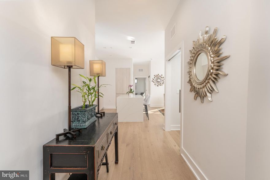 Introducing a rare and distinguished rooftop penthouse at The Dylan at Potomac Yard, offering an extraordinary level of privacy, light, and architectural presence.

One of only two residences in the entire community to feature a 10’ x 29’ private rooftop terrace, this exceptional home presents a truly one-of-a-kind outdoor retreat — ideal for elegant entertaining or quiet moments above it all. Southern and Western exposures bathe the interiors in natural light, while dramatic floor-to-ceiling windows and soaring 10-foot ceilings create a striking sense of volume and openness throughout.

The thoughtfully designed layout includes a generously proportioned primary suite, a large den that comfortably functions as an additional sleeping space, and two full baths. Refined contemporary finishes and clean architectural lines complement the home’s elevated aesthetic.

This remarkable offering also conveys three parking spaces — including one equipped with EV charging — as well as a private storage unit, an uncommon and valuable amenity package.

A singular opportunity within Potomac Yard, this penthouse embodies modern luxury, exclusivity, and effortless sophistication.