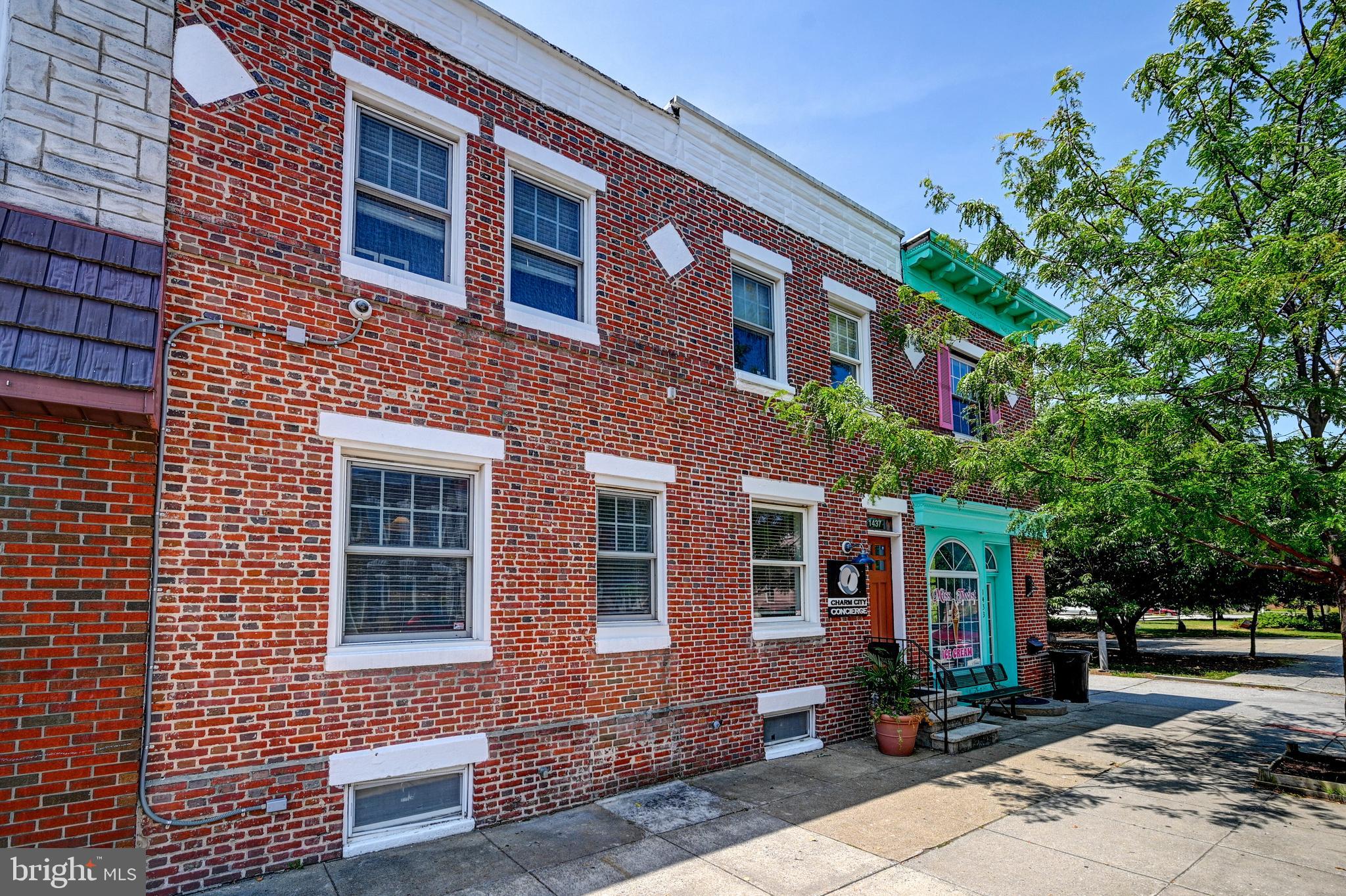 This spacious double wide, brick townhome office would be an ideal location for an insurance, financial or retail space. Live, Work and Play in the great neigbhood of Locust Point. This woderful space includes all of the “Charm City" features like random plank floors, exposed brick and a back patio to enjoy lunch or take a break from a hectic day. The first floor includes a welcoming seating area, Reception Desk, Conference Room adjacent to Two Offices, Powder Room and Kitchen. The second floor has 4 private offices and one loft office, a full bath and a bright lounge area. This bright space offers a glass roof lantern and allows light into the middle of the office and down the two-story opening to the first floor. This wonderful space is located minutes from I-95, I-295 and the BWI Airport. Tons of free parking around the building makes it easy to pop in and out.
