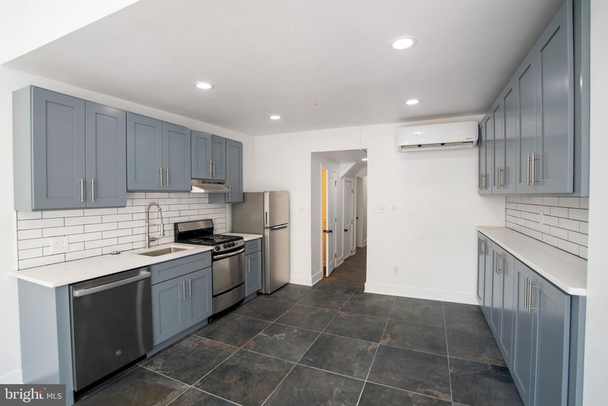 *Available NOW!*

Welcome to 1413 Lombard Street, Apartment 1F — a beautifully renovated residence nestled just half a block from Broad Street and the Lombard-South Broad Street Line station. This stunning 2-bedroom, 1.5-bath apartment offers modern living in one of Philadelphia’s most vibrant neighborhoods.

Step inside to discover new hardwood floors, sleek mini-split wall units for year-round comfort, and a thoughtfully renovated first floor traditional apartment layout. The kitchen features stainless steel appliances, gorgeous blue-toned cabinetry, and an elegant open concept with the living room, making it as functional as it is stylish. Both bedrooms are generously sized, with a third small room acting as a walk-in closet. The bathrooms are accented with crisp white subway tiles, and the convenient half bath adds flexibility for guests or roommates. The property also features a large backyard.

Located just steps from the Avenue of the Arts, Rittenhouse Square, and all that Center City Philadelphia has to offer — dining, shopping, cultural venues, and public transit are right at your doorstep. Also a short walk to Graduate Hospital, Jefferson, Penn Medicine (Lombard St.), Pennsylvania Hospital, rapid transit to Drexel Medicine, Temple University, Temple University Hospital, and University of Pennsylvania! Don’t miss your chance to live in a home that combines comfort, style, and an unbeatable location!

Lease Terms: Generally, 1st month, and 1 month security deposit due at, or prior to, lease signing. Other terms may be required by Landlord such as last month’s rent upfront. $65 application fee per applicant. Tenants are responsible for: electricity, cable/internet, & if property is OCF managed a $10/mo technology fee will be applicable; ask your agent for more info on managed status. Water is included in the monthly rent for this property. Additional fees or requirements may be applicable for units with Homeowners or Condo Associations. Landlord Requirements: Applicants to make 3x the monthly rent in verifiable gross income, credit history to be considered, no evictions within the past 5 years, and must have a verifiable rental history with on-time rental payments. Exceptions to this criteria may exist under the law and will be considered. Cosigners will be considered.

*Pets permitted, 2 Maximum – $500 deposit per pet