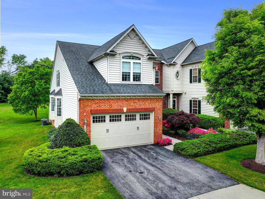 Coming Soon in Sought After Ellicott Meadows!  This first-time available End Unit, three level Townhouse, has been impeccably maintained from top to bottom.  The masterfully landscaped property provides an explosion of spring perennials.  You will be delighted every week with the new vibrant colors of the staggered plantings.  The entrance Foyer is flooded with morning sunlight through the lovely glass front door.  The main living level offers a well-appointed Kitchen with rich wood cabinetry including some with glass front doors to display your special treasures.  Neutral tone solid surface countertops, quality rated stainless-steel appliances and a substantial center island with additional closed cabinet space grace this heart of the home.  An extended dining area, surrounded by windows, is a delightful spot to get your day started.  This room opens to the massive Great Room with a two story vaulted ceiling.  The wood floors continue through this sun-filled area as it is surrounded by oversized windows and an extended, carpeted Sunroom that features two walls of windows.  Sliding doors take you out to private deck that is perfect for alfresco dining.  As expected in a Senior Living Community for 55 and better, there is a Main Level Primary Suite.  The extraordinary Bedroom is tastefully decorated with a feature wall, tray ceiling and dramatic window draperies with cornice.  There is also a substantial walk-in closet and full bath with a walk-in shower and built-in seat.  The main floor includes a Powder Room off the Foyer, a Laundry/Mud Room off the Kitchen and a glass double-door entry to the Library or, depending on your needs, a potential fourth Bedroom.  Ascend to the second level to find the pleasant open loft which is a multi-purpose bonus.  This area overlooks the Great Room and is sun-filled throughout the day.  Two generously sized Bedrooms share a full Bath.  There are an additional two walk-in closets and an insulated, unfinished utility/storage room on this level while each Bedroom has its own generous closet space.  Head to the Lower Level and discover a "Party-Sized" Family Room that includes a moveable two-piece bar and plenty natural light from multiple windows, another full Bath and unfinished Storage Room which includes a moveable work bench.  Community amenities include an artfully decorated Club House for parties, cards or weekly exercise classes, an In-Ground Pool and Pickle Ball and Tennis Courts; all included in the monthly HOA Dues.  The Community HOA and Condo Resale documents are available upon request. There are countless restaurants of International cuisine nearby.  Easy access to Routes 40, 70 and 29 can have you in Baltimore, Frederick and Washington in no time at all.  Come see for yourself and make this special offering your next home! This one will not last long!