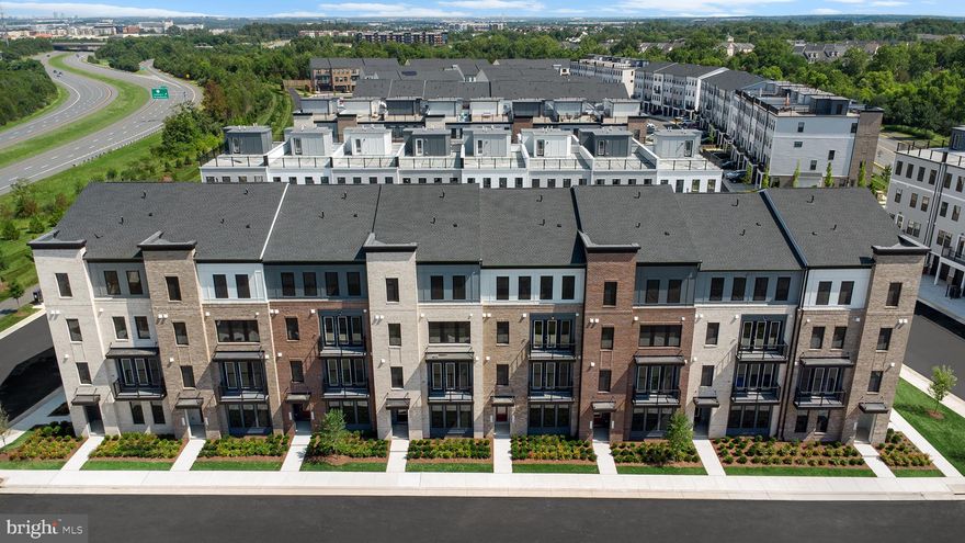 A brand new END TOWNHOME-STYLE CONDOMINIUM. Discover the Cameron 24-R1 – Homesite 201 at Demott & Silver—a one-car, rear-load garage condominium with three bedrooms, two full bathrooms, and one half bathroom ready for you to call home IMMEDIATELY!  Thoughtfully designed for everyday flexibility and comfort, this low-maintenance, townhome-style condo features a welcoming mudroom entry, open-concept living for seamless gatherings, and a second-level deck for effortless indoor-outdoor connection. With 2,157 finished square feet on 4 levels, this newly completed condo by Van Metre Homes offers an abundance of natural light, a main level with a spacious chef-inspired kitchen featuring upgraded cabinets, quartz countertops, stainless steel appliances, and wide Luxury Vinyl Plank (LVP) flooring in the main living areas. This townhome-style condominium features an impressive primary suite with a walk-in closet and a luxury bathroom with double sinks, soaking tub, and large shower with built-in seat. The home lives like a townhome, but has the low-maintenance, easy lifestyle of a condominium. Take advantage of closing cost assistance by choosing Intercoastal Mortgage and Walker Title. This home is truly a must-see, promising comfort, style, and quality. Schedule your appointment today and make your dream home a reality!-----Discover Demott & Silver, Van Metre’s exceptional community of townhomes and townhome-style condominiums nestled within the master-planned Broadlands community. This sought-after neighborhood offers unparalleled convenience with walking distance access to Metro’s Silver Line and the area’s most desirable amenities. Residents relish in a host of top-notch amenities across Broadlands, including a clubhouse, fitness center, three pools, tennis courts, vast green spaces, and extensive hiking and biking trails. With shopping, restaurants, Metro’s Ashburn Station, a bus stop, and nearby commuter routes at your fingertips, Demott & Silver is set to become the epitome of a superior community in Broadlands.----- *Other homes sites and delivery dates may be available. Pricing, offers, and availability are subject to change without notice. Images, renderings, and site plans are for illustrative purposes only and may not reflect actual homes or features. Some images may depict interior designs created in collaboration with AI. Additional Terms and Conditions may apply. Please see a Van Metre Sales Advisor for details.