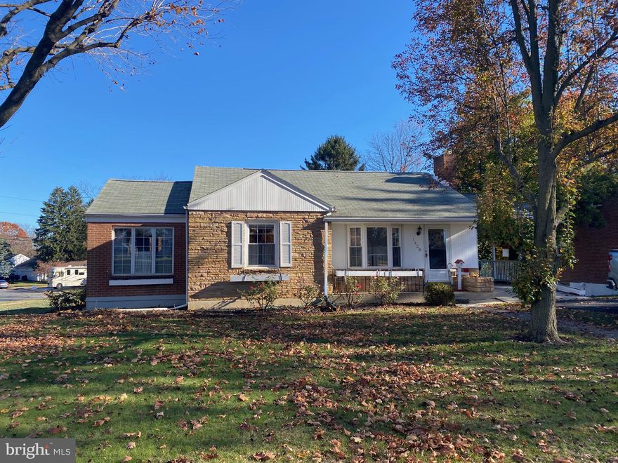 Come see this charming cottage on a corner lot in sought-after north end! **Being sold AS-IS**Estate Sale* Great investment opportunity or customize for yourself!  This lovely home has lots of possibilities with a brick fireplace in the living room, eat-in kitchen, and a sunroom addition filled with light.  The basement has been mostly finished adding approx 500 sq ft of living space and another full bath.   A walkout provides easy access to the back yard which includes a large shed. The spacious lot leaves room for possible expansion. Schedule your showing soon, this one won't last! More photos coming soon.