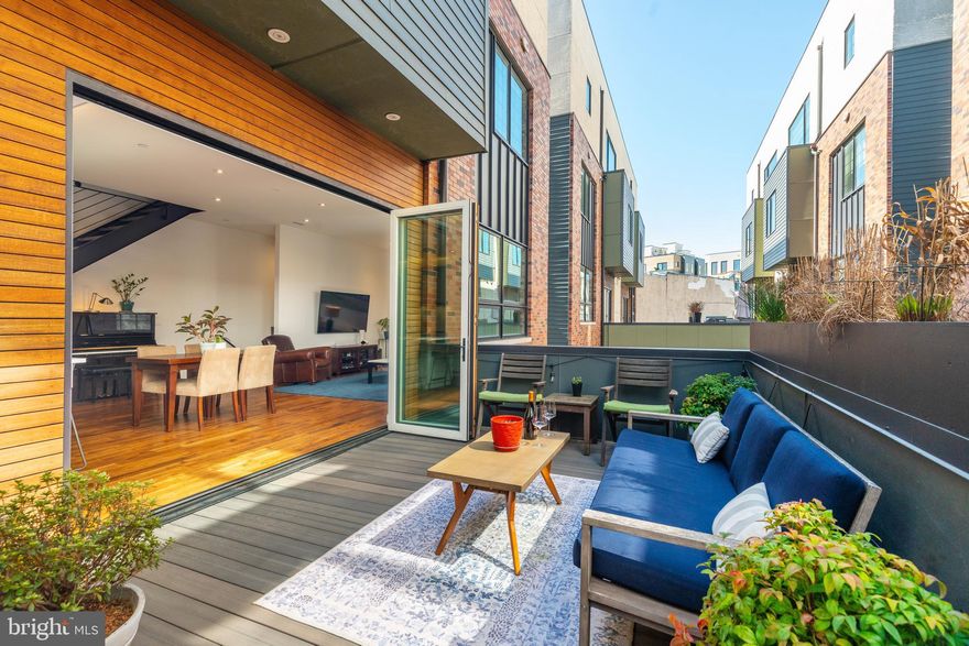 Welcome to one of the most sought after townhomes in the Fishtown neighborhood. 1124 Shackamaxon #4 is 1 of 8 meticulously crafted private homes by the esteemed Kassis Ventures development team. This home truly has it all: quality construction, beautiful finishes and style, two-car secure private garage,  two outdoor spaces, open and airy floor plans, oversized windows, and 4+ years remaining on a tax abatement — only steps away from Frankford Avenue's commercial corridor full of culinary, shopping, and vibrant nightlife attractions! Surrounded by excitement, 1124 Shackamaxon also affords unique privacy and tranquility in the peaceful "Shack 8" community set back from the main road with its oversized drive aisle and garage parking.

Shack #4 is LOADED with upgrades that include a bespoke kitchen designed by Spogue with a Bosch appliance package and dual ovens, an oversized kitchen island, engineered hardwood floors,  Lutron adjustable lighting, custom window treatment by Allure with remote and bluetooth features, built-in hookup for optional gas fireplace in living room, an after-market laundry chute system, and much more!  This is luxury living with unparalleled comfort and quality offered at tremendous value in the heart of Fishtown. Don't miss an opportunity to schedule your showing today!