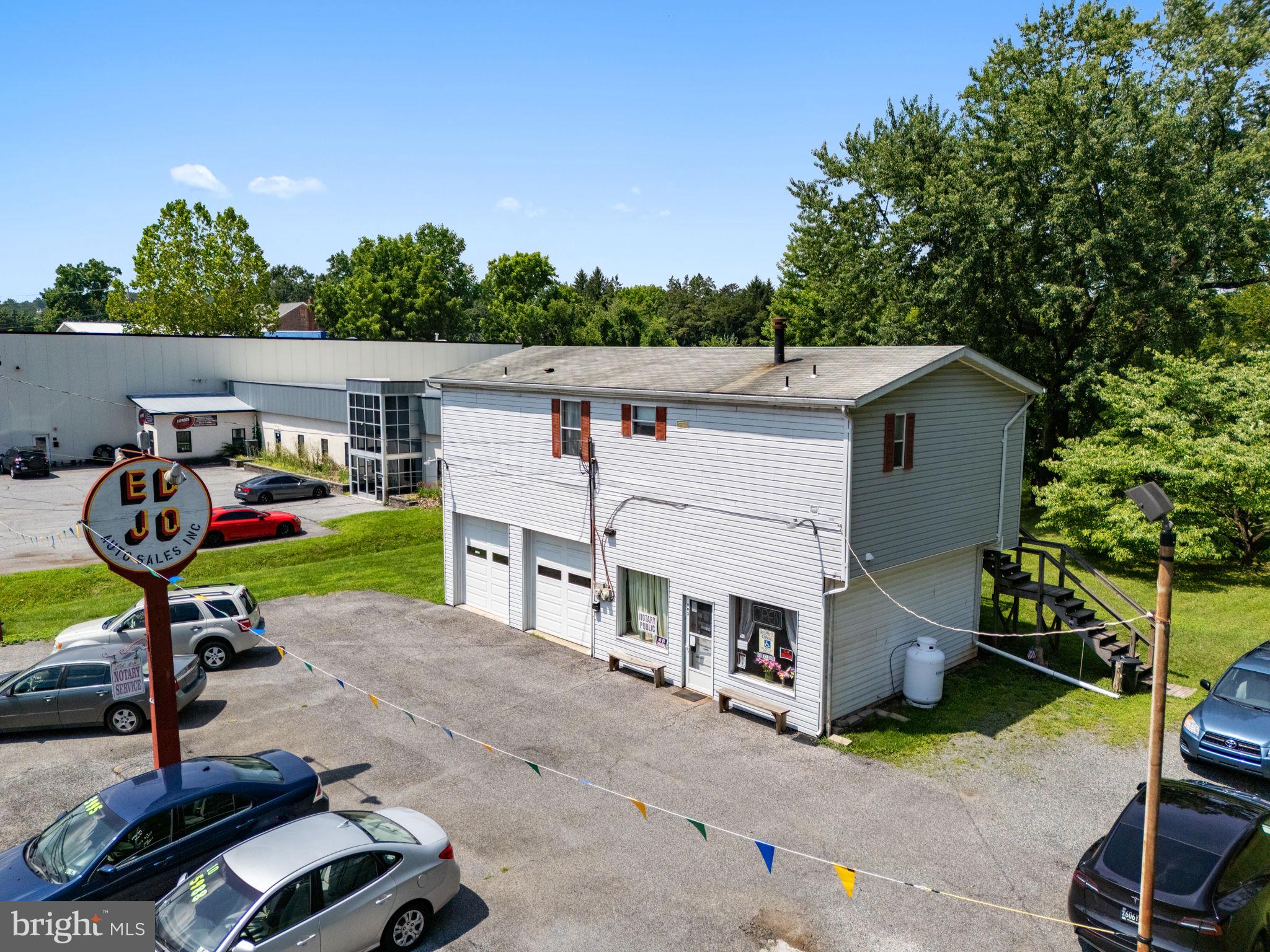 A rare opportunity in North Coventry Township, this versatile multi-use property features a fully equipped auto garage on the lower level and a spacious 3-bedroom, 2-bath residence above. Ideal for owner-occupants, small business owners, or investors, the setup supports both personal living and commercial use.
The garage includes two full bays and is outfitted with essential equipment for automotive work: an above-ground air compressor, an air lift in Bay 2, and a tire changer. With high ceilings and durable concrete flooring, the garage is well-suited for repair work, detailing, or light industrial needs.
The upstairs residence offers three bedrooms and two full bathrooms, along with an open living and dining area. The space provides flexibility to live on-site, generate rental income, or operate an office or business headquarters.
Located in North Coventry Township with easy access to Routes 100 and 422, this property combines function and opportunity in a highly accessible setting.