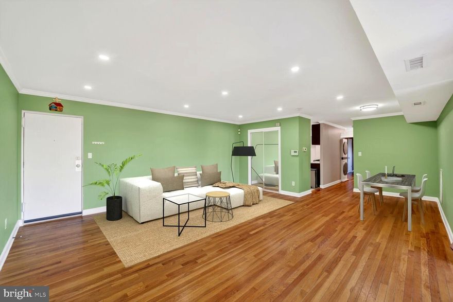 Welcome to this beautifully maintained 2-bedroom, 1-bath condominium offering comfort, style, and convenience. The home features stunning hardwood floors throughout the entire apartment, creating a warm and elegant atmosphere.Updated kitchen and bathroom with modern finishes. Spacious and cozy private balcony, perfect for relaxing. Convenient in-unit laundry. Well-kept community ideally located near New Carrollton Metro Station with easy access to I-495, shopping, dining, and entertainment. A perfect blend of comfort and convenience—move-in ready!