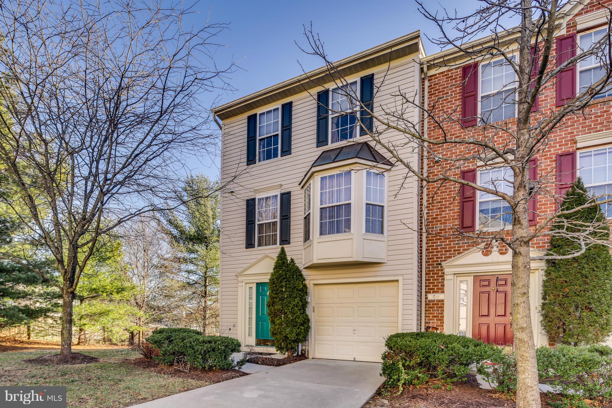 Cream of The Crop. Wonderfully updated EOG townhome w/beautifully renovated kitchen w/hardwood floors, kitchen island, granite counters & brand new carpet in the bedrooms. A deck & nice family room just off the kitchen & also a separate large living room/dining room combo. New lighting in bathrooms & framed mirrors. Main level boasts a large recreation area with a gas fireplace. Close to shopping.