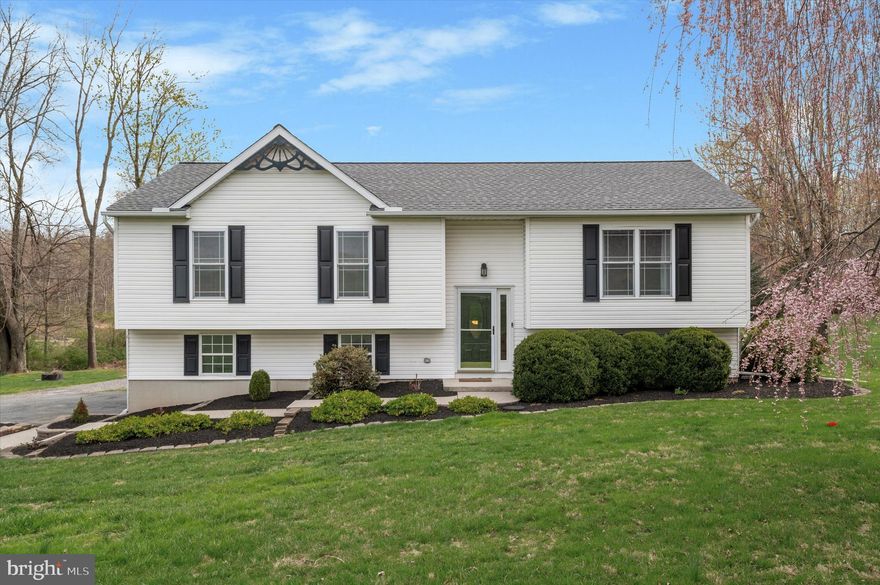 Nestled on a peaceful 1-acre lot with sweeping country views, this beautifully updated single-family home offers the perfect blend of comfort, style, and space. With 3 spacious bedrooms, 2 1/2 baths, and an abundance of natural light throughout, this home is ideal for those seeking serene country living with all the modern amenities.

Highlights of this home include:

NEW ROOF (2024) – Peace of mind with a recent roof replacement.

DETACHED 30x30 GARAGE – One of the standout features of the property is the massive 30x30 detached garage, offering plenty of room for vehicles, storage, or a workshop. It also comes equipped with its own separate 200-amp electric service, making it perfect for any hobbyist or tradesperson.

The open, updated kitchen boasts a stylish tiled backsplash, stainless steel appliances, and classic white cabinetry, offering ample storage space. The expansive composite two-tiered deck with vinyl rails is perfect for outdoor living and entertaining, providing a wonderful space to enjoy the country views. The upper deck includes an attached gazebo and measures 12x16, while the lower-level deck measures 12x12.

The daylight walkout lower level, with laminate flooring, features a cozy fireplace, built-in bookshelves, a dry bar with cabinetry, and a convenient half bath—making it the ideal space for relaxation or hosting guests. You'll also find the laundry room with a dedicated workspace, along with the 2-car attached garage, offering more convenience and storage space for your vehicles.

This home combines the charm of country living with the convenience of modern updates, offering a perfect blend of tranquility and style. Don't miss the opportunity to make this dream home yours—schedule a tour today!