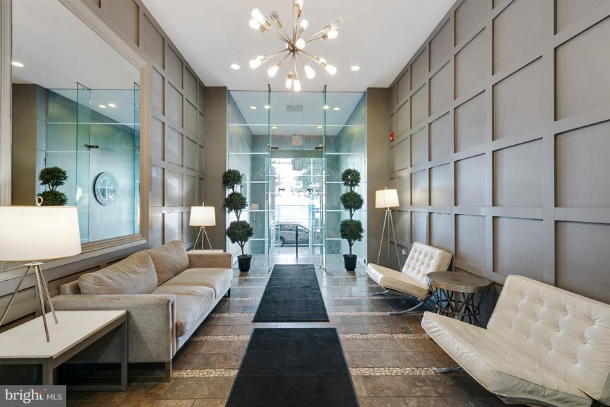 This 1 bedroom 1 bath unit is a great opportunity to live in or invest in the Marine Club! Walk in and you will find a spacious hall closet and a stacked washer and dryer to your left. The updated bathroom has a whirlpool bathtub and a walk in shower both with marbled tiling. The bedroom is lofted which allows in natural light and keeps the space feeling open while still allowing privacy. The kitchen is updated with stainless steal appliances and flows into the living area which has large windows spanning the length of the exterior wall for optimal natural light. The location is fantastic- there is Target, Sprouts grocery store, the Broad St line all within 1 block!! 
This unit is vacant and photos are virtually staged.