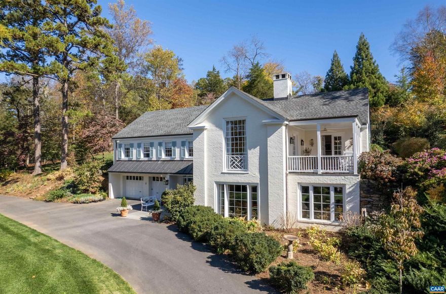 Beautifully renovated home in Bellair. Dining room opens directly onto a covered porch, perfect for seamless indoor-outdoor dining and entertaining. Living room captivates with a vaulted ceiling, custom floor-to-ceiling bookcases, and lots of natural light. The terrace level features a spacious rec/family room and a dedicated exercise room, ideal for fitness and relaxation. The property also includes a two-car garage, providing ample space for vehicles and storage. Outside, the owner has meticulously landscaped the grounds, planting 50 trees and over 1,000 perennials that flourish under an efficient irrigation system. Conveniently located near Boars Head, UVA and easy access to downtown.,White Cabinets,Fireplace in Living Room,Fireplace in Rec Room