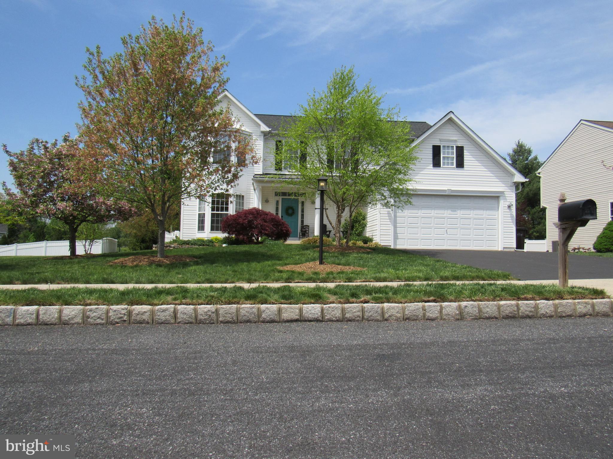Welcome to this beautifully maintained and thoughtfully designed home, perfect for comfortable living, elegant entertaining and stunning outdoor amenities! Enter through a spacious foyer with a grand staircase leading to the second level. The heart of the home is a chef’s kitchen featuring abundant counter space, a butcher block island ideal for meal prep and serving, and a built-in wine cooler —perfect for entertaining. The open floor plan seamlessly connects the kitchen to a large family room, anchored by a stunning stone fireplace with a cozy gas insert. Just steps away is your private backyard oasis, boasting a heated in-ground pool, a tranquil fish pond, and a serene, fenced-in setting that’s perfect for summer gatherings and year-round enjoyment. This home is designed for entertaining, with formal dining and living rooms adding a touch of elegance. Upstairs, retreat through double doors to a spacious primary suite, complete with a walk-in closet and a luxurious en-suite bathroom featuring a jacuzzi tub, shower, double vanity, and linen closet. Three additional bedrooms and a second full bathroom with a double vanity complete the upper level. The finished basement offers additional living space for relaxing or recreation and includes a fitness room complete with a weight set. You’ll also find abundant storage throughout. A roomy laundry/mudroom connects to an oversized garage with extra storage. Other highlights include ceiling fans, recessed lighting, and access to a paved walking trail shared with nearby communities. Conveniently located near shopping and major roadways, this exceptional property truly offers the best of both comfort and convenience. Don’t miss this rare opportunity to own a move-in ready home with resort-style features!