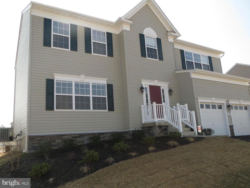 Almost new spacious home nicely upgraded throughout.  You will love the open kitchen with 9ft ceilings,  42" cabinets, granite counter tops, and lots of natural light.  Cozy gas fireplace for those cool nights. Master suite includes a large walk in closet, double vanities, deluxe bath, and double sinks.  Unfinished lower level waiting for your finishing touches.