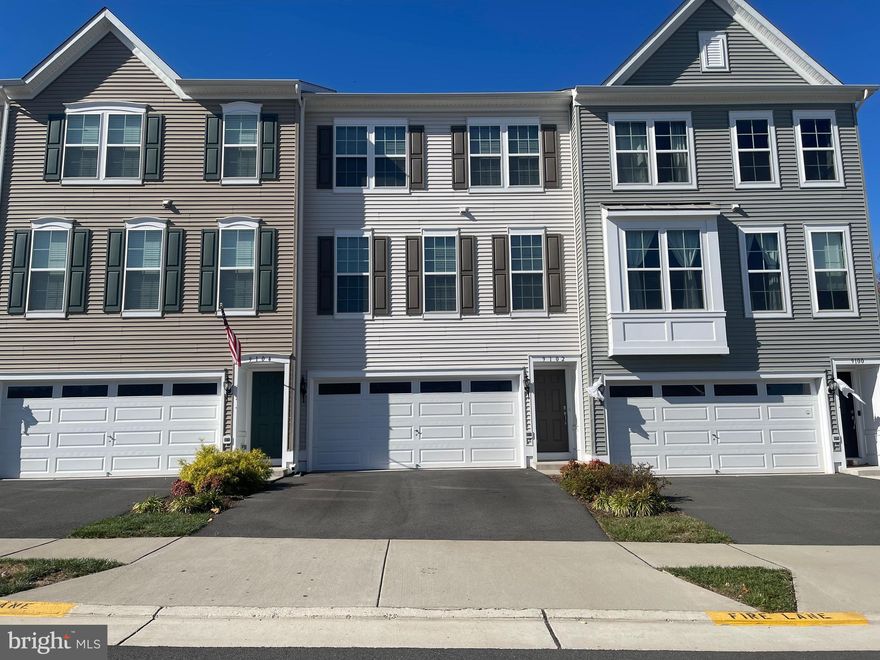 This gem of a rental, at a great price, is located on a quiet neighborhood street, in the heart of Manassas, near restaurants, coffee shops, stores, parks, and playgrounds. Convenient to Signal Hill Park and major commuter routes, the location is ideal. Built-in 2020, this townhome has three finished levels. Features include an updated kitchen with granite countertops and stainless steel appliances, LVP flooring, an inviting balcony, three bedrooms including a spacious primary bedroom with ensuite and walk-in closet, 3.5 baths, and 9'-10' ceilings on the main level. The centrally located kitchen opens to both the dining and living rooms. The living room also showcases a welcoming gas fireplace.  Bonus space includes a large family room on the lower level and a full bath. The icing on the cake is the two-car garage and a driveway with space for 2 cars!  The washer and dryer are brand new. This property is professionally managed by a relocation company, Dwellworks.