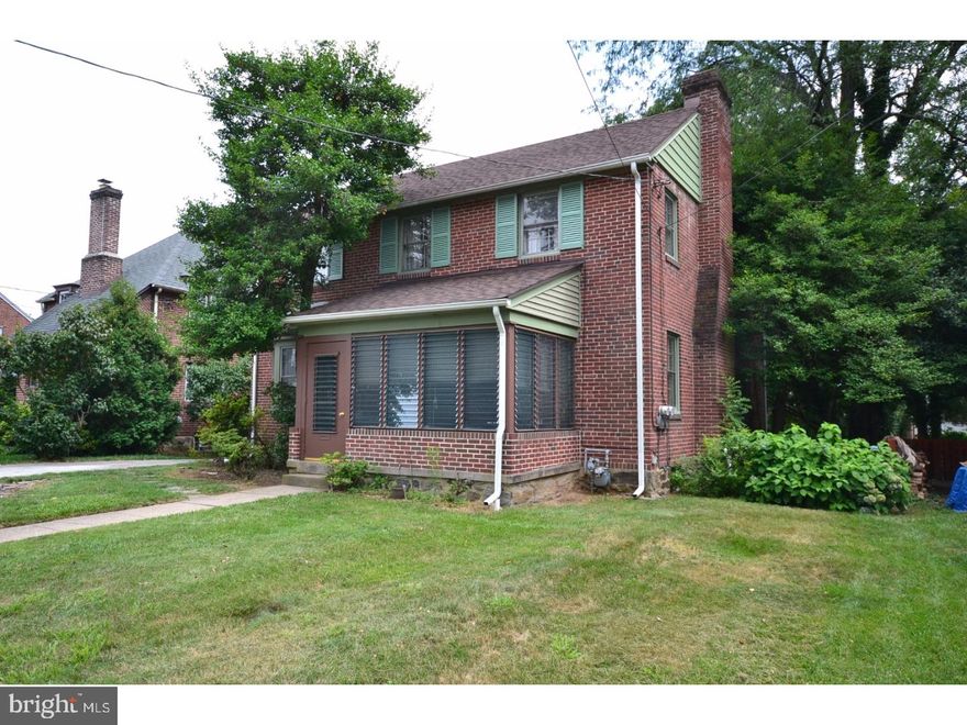 Seize the opportunity. Super Center Hall all Brick Colonial on peaceful, picturesque West Essex Avenue. Just update the Kitchen a bit after you've settled in! This is a great opportunity to invest in a special neighborhood! Enter through the Enclosed Sun Porch to the Center Hall which opens to the Spacious Living Room with Fireplace and Dining Room with Bay Window. The Breakfast Room has Corner China Cabinet, the Kitchen exits to the Driveway, Attached Garage and delightful Back Yard and leads to the full Basement with Terrific Updated Systems.  The Second Floor is home to FOUR Bright Corner Bedrooms.  The Master Bedroom has a Private Bath, one Bedroom has delightful built-in Bookcases and there is a Ceramic Tile Hall Bath! The Kitchen TLC needed is easy (new flooring, counter top-sink). Just remove the wallpaper in the Breakfast Room area and you have become picture perfect! Newer GAS Heat with Central AIR. This sought after quiet street is just a few blocks from shopping, new eateries and the Open Air Farmer's Market which is Exceptional. Don't miss the fabulous "Icery" gelato shop on your way to the Train! Just 15 minutes to Center City, the Airport and Rt 476!