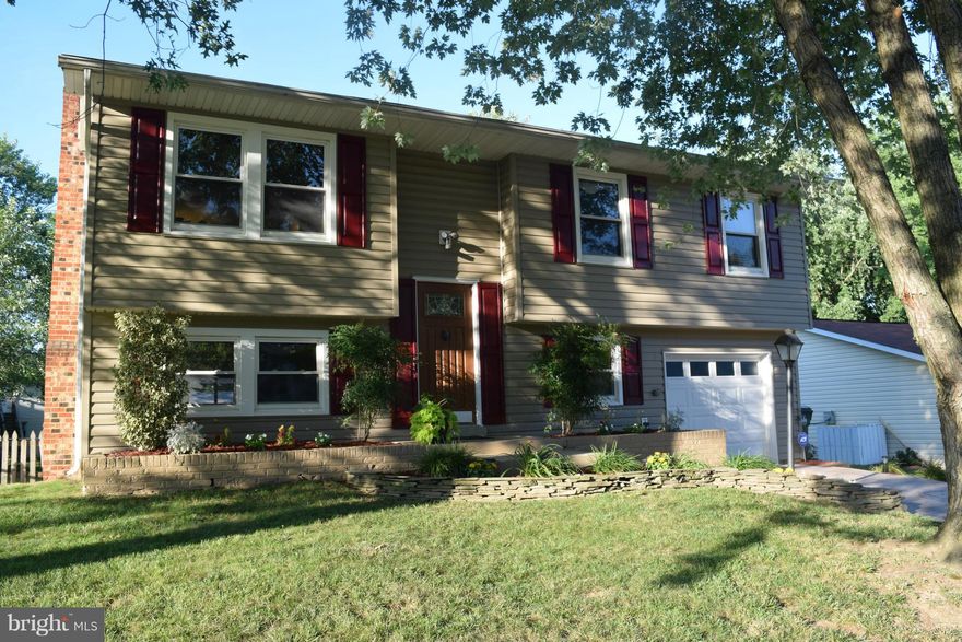 WOW! This immaculate home boasts an updated kitchen w granite counters, newer appliances, pristine white cabinetry. Family room with gas fireplace. Upper bath w jetted tub.Stamped concrete driveway. Large backyard w/SWIMMING POOL and ample sundeck entertainment space. 55" TV on the living room wall conveys. Replacement windows.1 car garage. W/ D stay. This is truly a " just move in " home! Hurry!.