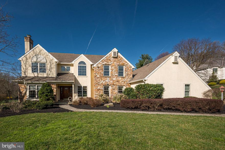 Stunning PA Farmhouse perfectly poised on over an acre in sought after Fox Ridge in Willistown Township. Rarely does a home become available in this pristine neighborhood. Paver patio leads to the elegant front entranceway, foyer with slate floor, window seat picture window and wainscoting. Oak stairway leading to the second floor. Impressive step down living room featuring a marble surround fireplace, beautiful mantel, hardwood floors, crown molding and French doors to the family room, perfect for entertaining. Formal dining room, with chairrail, crown molding and parquet hardwood floors. Family room with random width hardwood floors, floor to ceiling stone fireplace, built ins and French doors leading to the sunroom with slate floor and terrific views of the rear yard. French doors take you to an impressive paver patio with paver walkway to the driveway. Morning room with 12x12 ceramic tile, butlers pantry bar area with sink, custom kitchen cabinetry and gleaming Corian counter tops, stainless steel double oven/microwave. Bosch dishwasher and ceramic tile backsplash. First floor study with oak built ins and hardwood floors. Powder room with pedestal sink, entrance to the 3 car garage, laundry room and secondary family entrance leading to walkway from the driveway. Primary suite with ceiling fan, large walk in closet, new primary bathroom with ceramic tile floor which is heated, ceramic tile shower, double vanity with granite tops, dressing vanity with granite top and jacuzzi tub. 3 additional nicely sized bedrooms and super nice hall bathroom with newer quartz counter top and ceramic tile floor. Finished basement with powder room. Central vacuum. You are going to love the well manicured level lot! This Malvern beauty is in the perfect neighborhood within the acclaimed Great Valley School District and close to downtown Malvern & West Chester. Location & Superior condition!