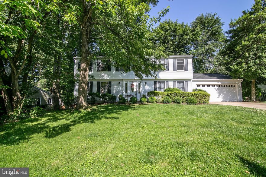 Price significantly reduced!  5 Bedrooms upstairs, one of the largest models in the neighborhood!   Wall was removed on main floor between family room/living room for more living space  with windows added in living room for more natural lighting .  Brand new carpet on all 3 floors! Ceramic tiles in foyer and kitchen.  Granite countertops and painted cabinets in kitchen.  Custom front door.  Main floor laundry room off kitchen.  New HVAC 2018.  Manicured yard with Beautiful curb appeal!  Backyard fenced in with room to play and deck for entertaining!  The neighborhood Lake is 109-acres large with 3 beaches (lifeguarded in summer), boat ramp, boat storage, fishing in stocked lake, playgrounds, ball fields, dog park, 18-hole golf course, community library.  Pools, golf, and tennis are available with memberships.  Walking distance to award winning Henderson Elementary; a focus school for Children's Engineering (STEM).  Close to bus and commuter lines/lots.  You won't want to miss seeing this one!