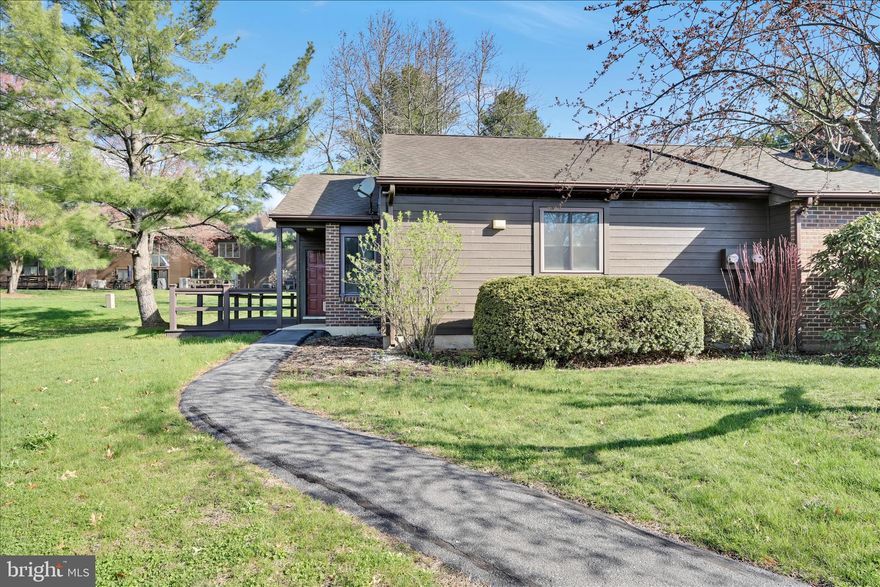 Enjoy the PineBrook lifestyle in this highly sought-after ranch style, end unit townhouse. Two bedrooms & two full bathrooms. Primary bedroom includes large walk in closet & full bathroom. Sundrenched living & dining areas. New French door to the large, private Trex deck, overlooking the private back yard. The deck also includes a custom, retractable awning. .Updated kitchen with granite countertops and all appliances, convenient pantry.  New windows throughout, new HW heater, washer/dryer remain.  Luxury vinyl planking throughout.  Blue Mountain Schools. One floor living at it's best!