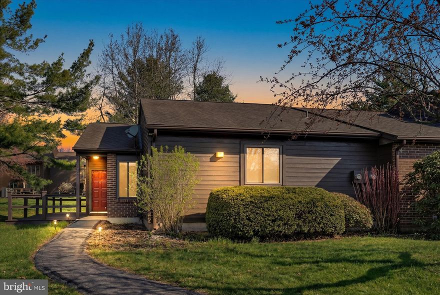 Enjoy the PineBrook lifestyle in this highly sought-after ranch style, end unit townhouse. Two bedrooms & two full bathrooms. Primary bedroom includes large walk in closet & full bathroom. Sundrenched living & dining areas. New French door to the large, private Trex deck, overlooking the private back yard. The deck also includes a custom, retractable awning. .Updated kitchen with granite countertops and all appliances, convenient pantry.  New windows throughout, new HW heater, washer/dryer remain.  Luxury vinyl planking throughout.  Blue Mountain Schools. One floor living at it's best!