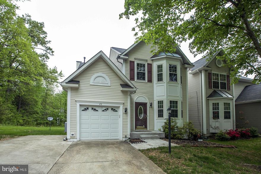 Gorgeous SFH on Cul De Sac Lot. Deck, backs to trees, walk-up bsmt, extended driveway for extra parking. Main lvl hdwd flrs for sep liv & din rm. Updated kitch w/ tile, granite, SS, eat in table space, and open concept to family rm. Upper lvl MA BR w/ lg bay window for nat light. MA BA 2 vanities, sep tub/shower, tile flrs. Lower lvl extra rm, huge rec rm, full BA, and new carpet. A Must See!