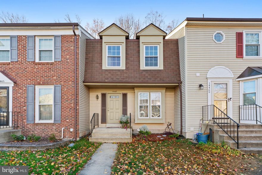 Owners recently upgraded this home with all new Laminate Plank flooring throughout the entire home. NEW whole house Interior Paint, New Dishwasher. A modern kitchen with enough room for a cozy breakfast, natural gas cooking with Stainless-Steel appliances! A pass-through from Kitchen to Dining Room for easy serving and conversation. Living Room overlooks the woods behind the home.  Upper level has two very generous bedrooms. One bedroom has a full wall of closets and a private updated bath with walk-in shower. The second large and bright bedroom has a generous size closet with a hall full bath with tub/shower. Fantastic lower level with a NEW full bath for guests. This room is very versatile and can be used as a rec room, office, or a third bedroom The utility room has a natural gas hot water heater.  Very Neutral decor throughout! Two reserved parking spaces are located directly at your front door! Community amenities include an outdoor pool, playground, tennis/basketball courts, and trails. Convenient commuter access as well as METRO lot. Minutes to shopping, restaurants, and grocery stores with Giant, Starbucks, Lidl, movie theater and gyms. Less than 5 minutes to your local elementary and middle schools.